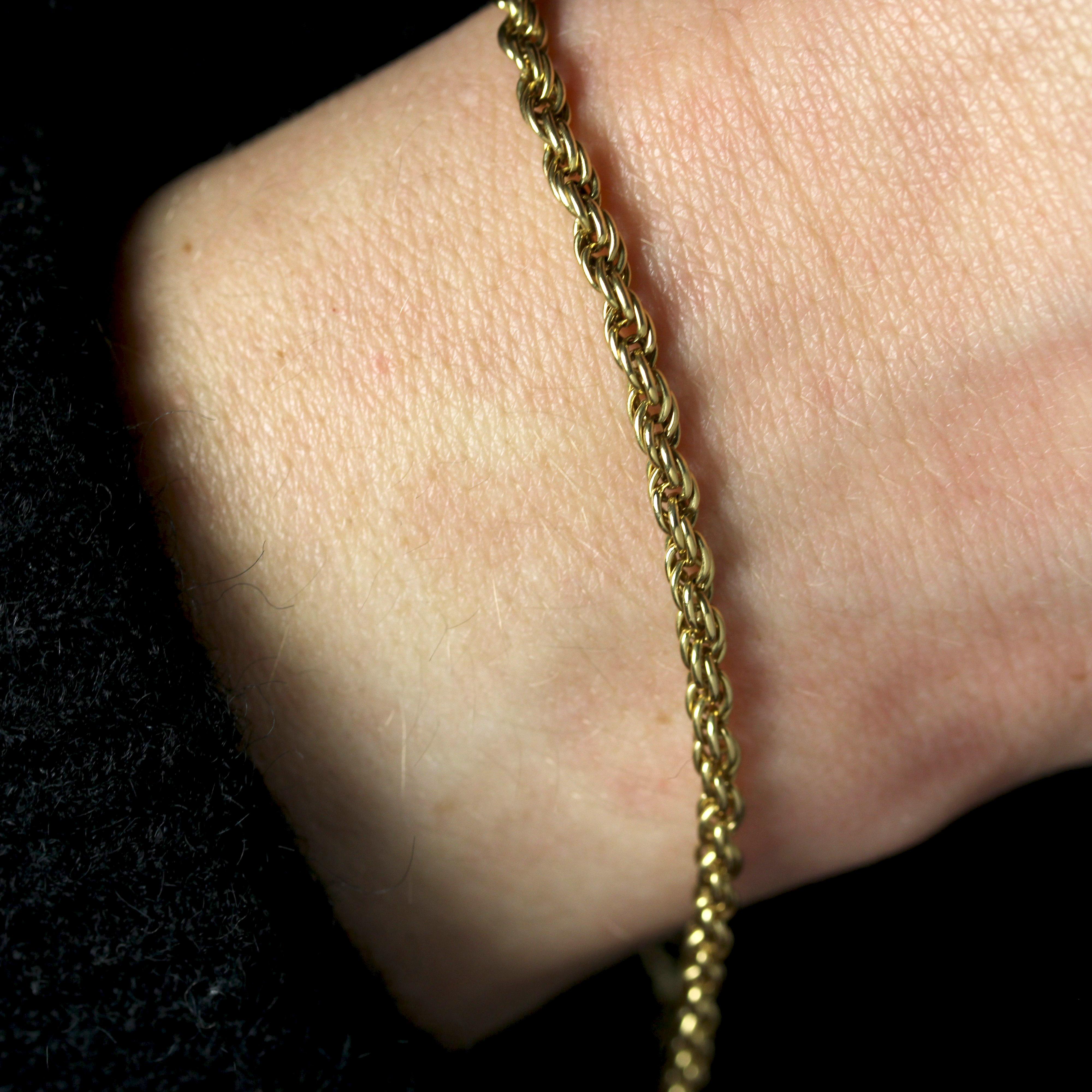Bracelet moderne de seconde main à maillons torsadés en or jaune 18 carats en vente 1
