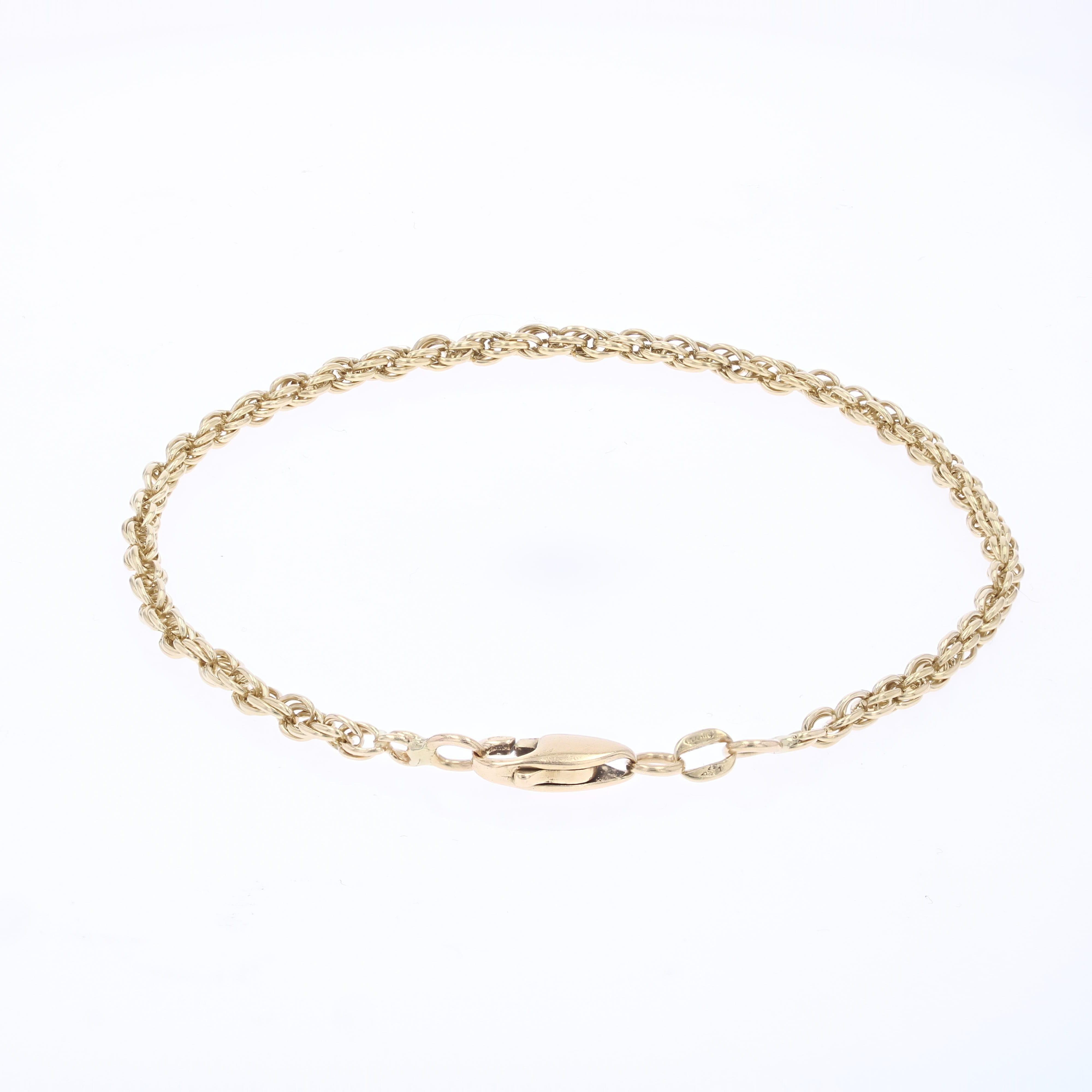 Bracelet moderne de seconde main à maillons torsadés en or jaune 18 carats en vente 2