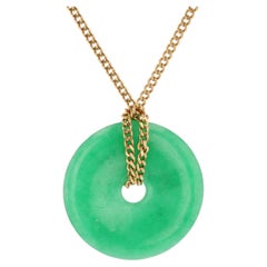 Collana moderna di seconda mano con disco di giada e catena in oro giallo 18 carati