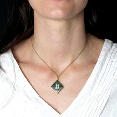 Modern Second hand Nephrite Jade 18 Karat Yellow Gold Chinese Character Pendant