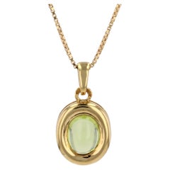 Modern Second-Hand Peridot 18 Karat Yellow Gold Pendant Necklace