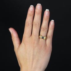 Modern Second-Hand Sapphire Diamonds 18 Karat Yellow Gold Knot Ring