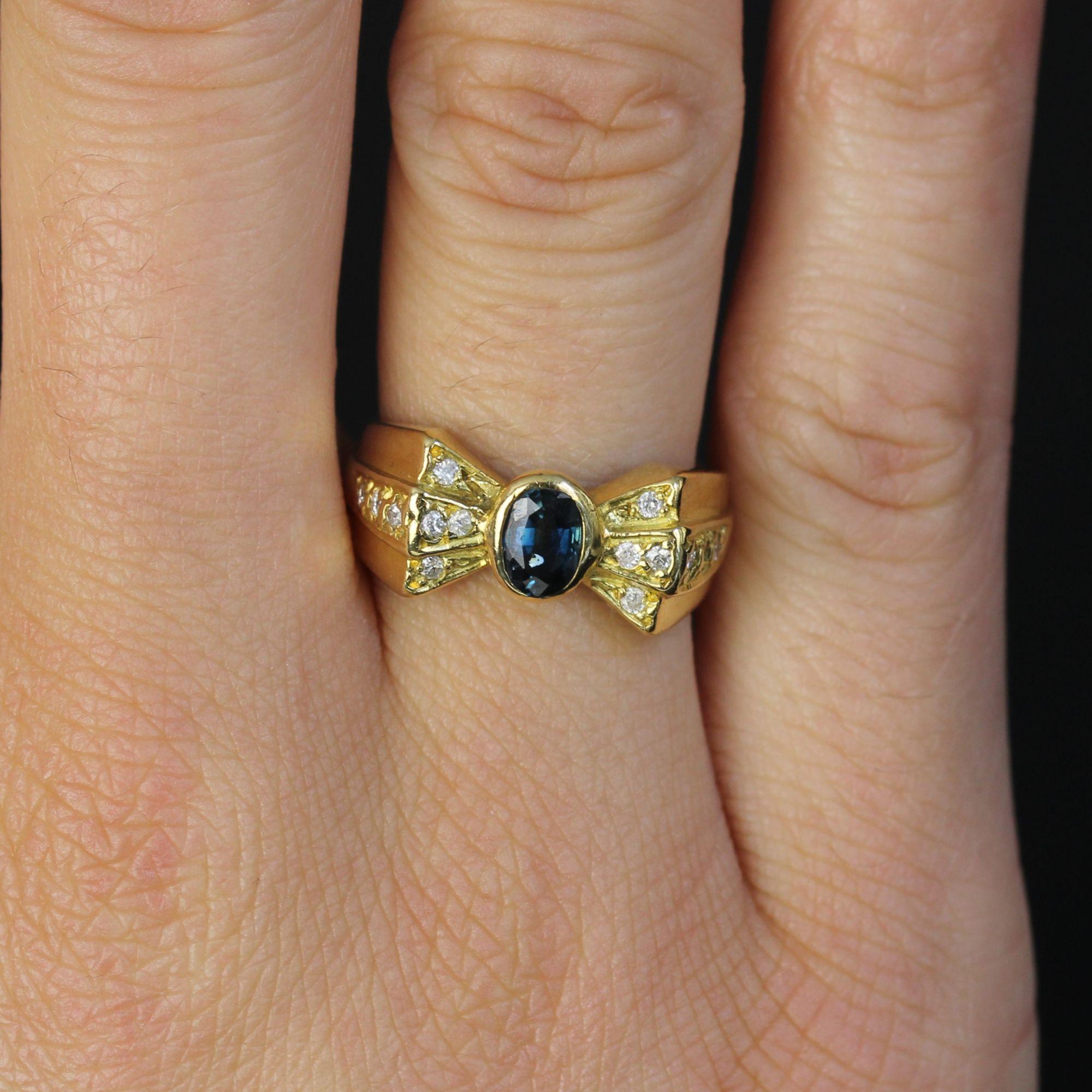 Women's Modern Second-Hand Sapphire Diamonds 18 Karat Yellow Gold Knot Ring For Sale