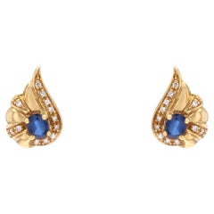 Moderne zweite Hand Saphir-Diamanten-Ohrstecker aus 18 Karat Gelbgold mit Schleife