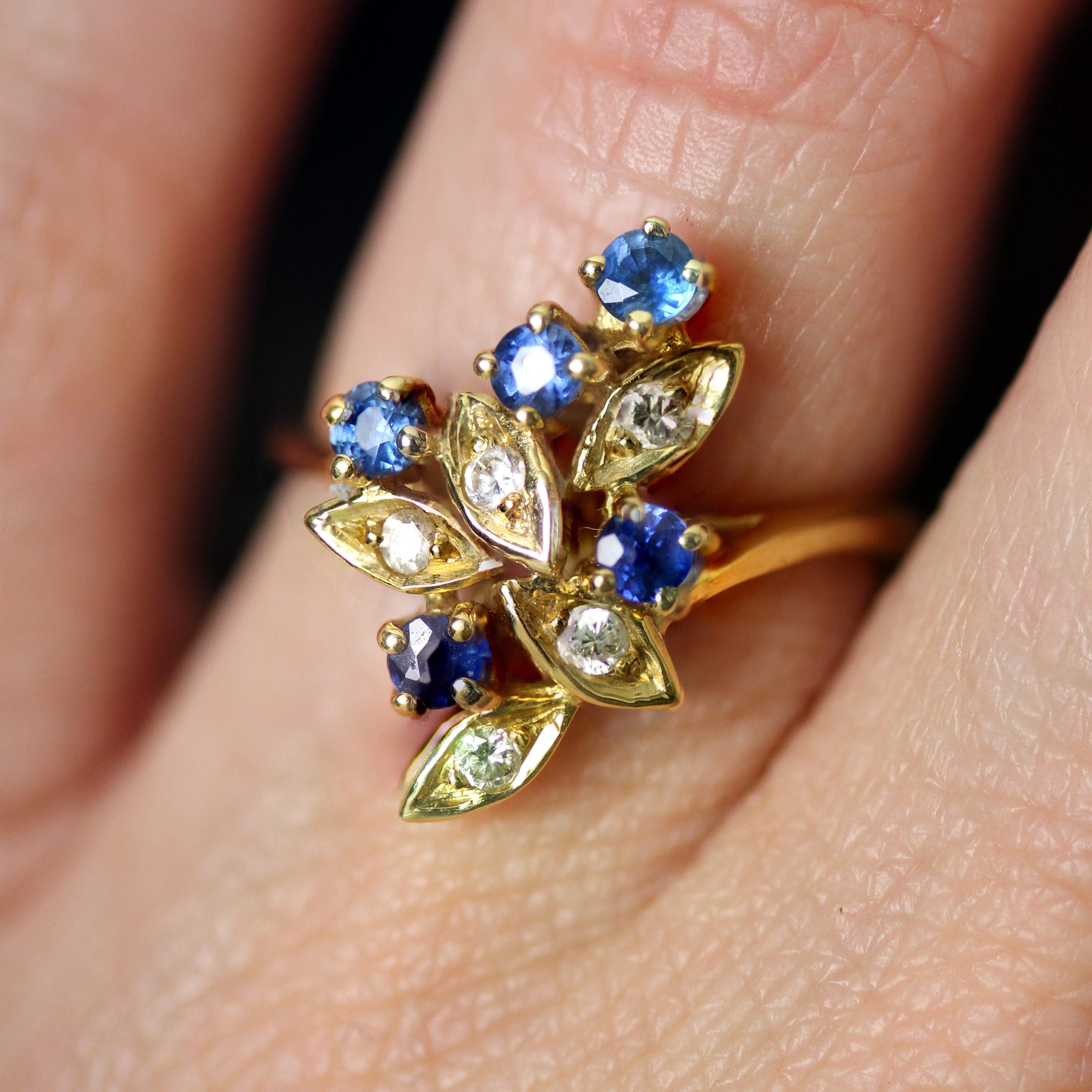 Modern Second-Hand Sapphires Diamonds 18 Karat Yellow Gold Leaves Ring For Sale 1