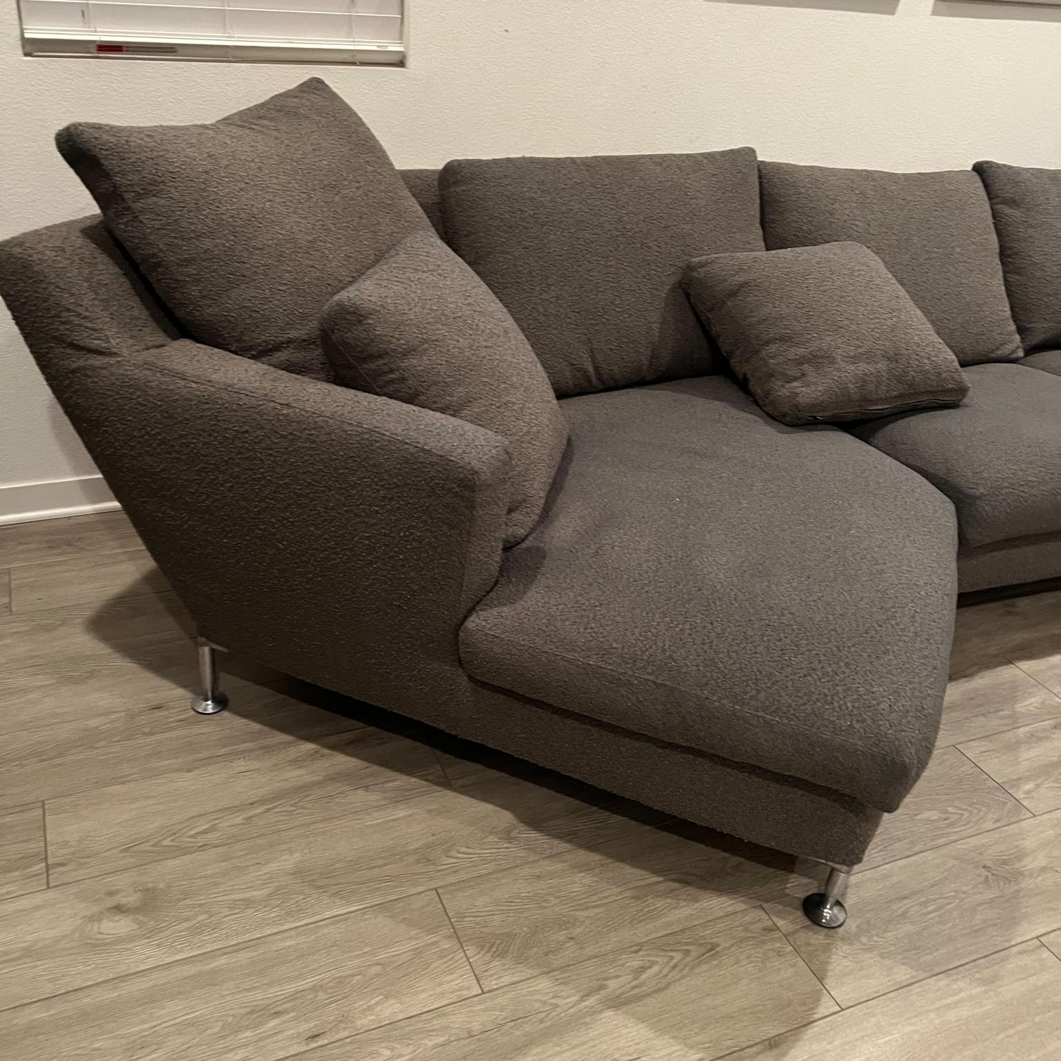 Sectional sofa HARRY designed by Antonio Citterio for B&B.
The 'Harry' sofa is named after Harry Bertoia
Made in Italy for the USA.
Sectional features 2 seats with lounge seat on the left side. 
Booster cushions included.
Iconic aluminum