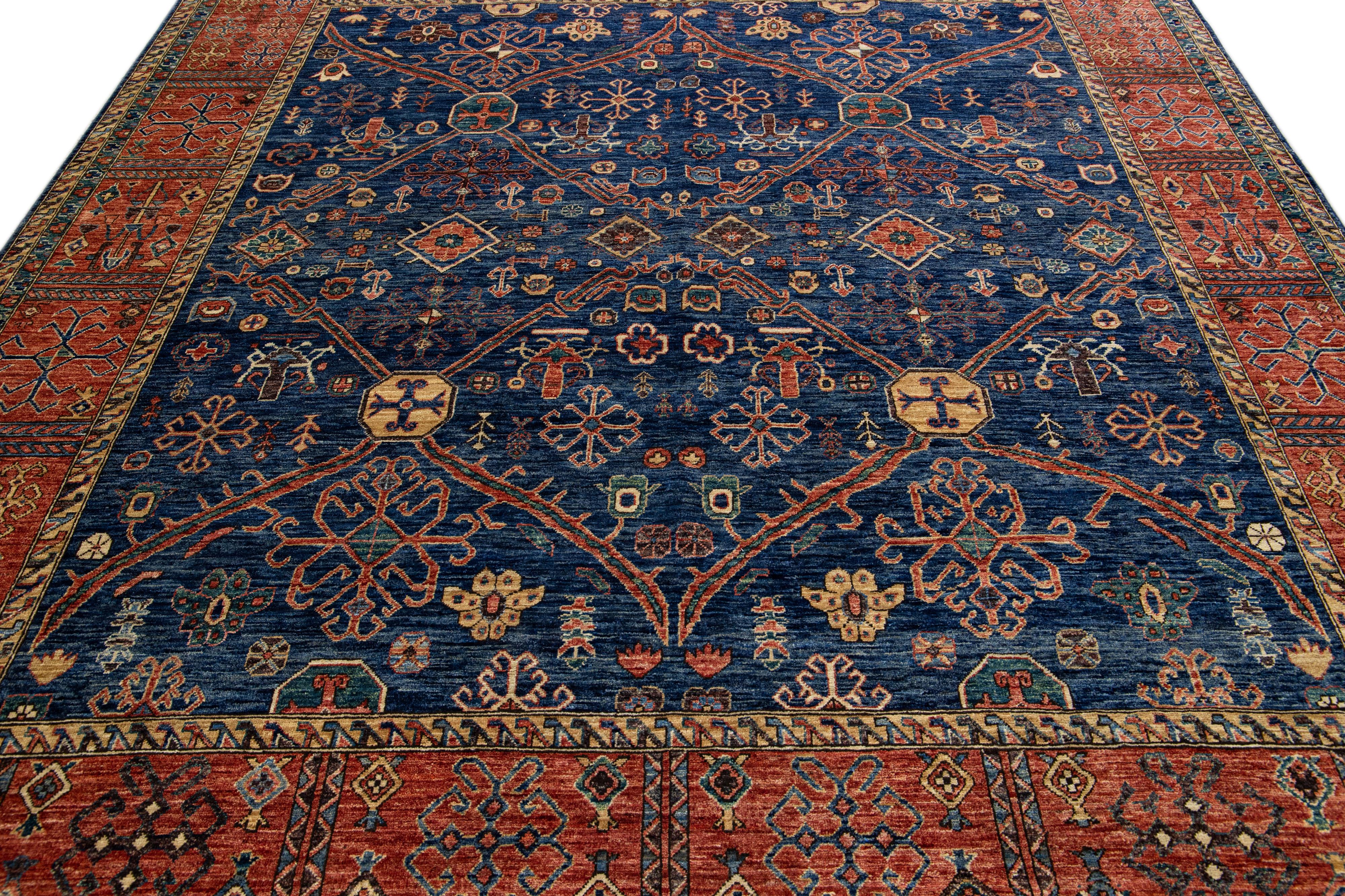 Islamic Modern Serapi Style Handmade Geometric Floral Blue and Rust Square Wool Rug For Sale