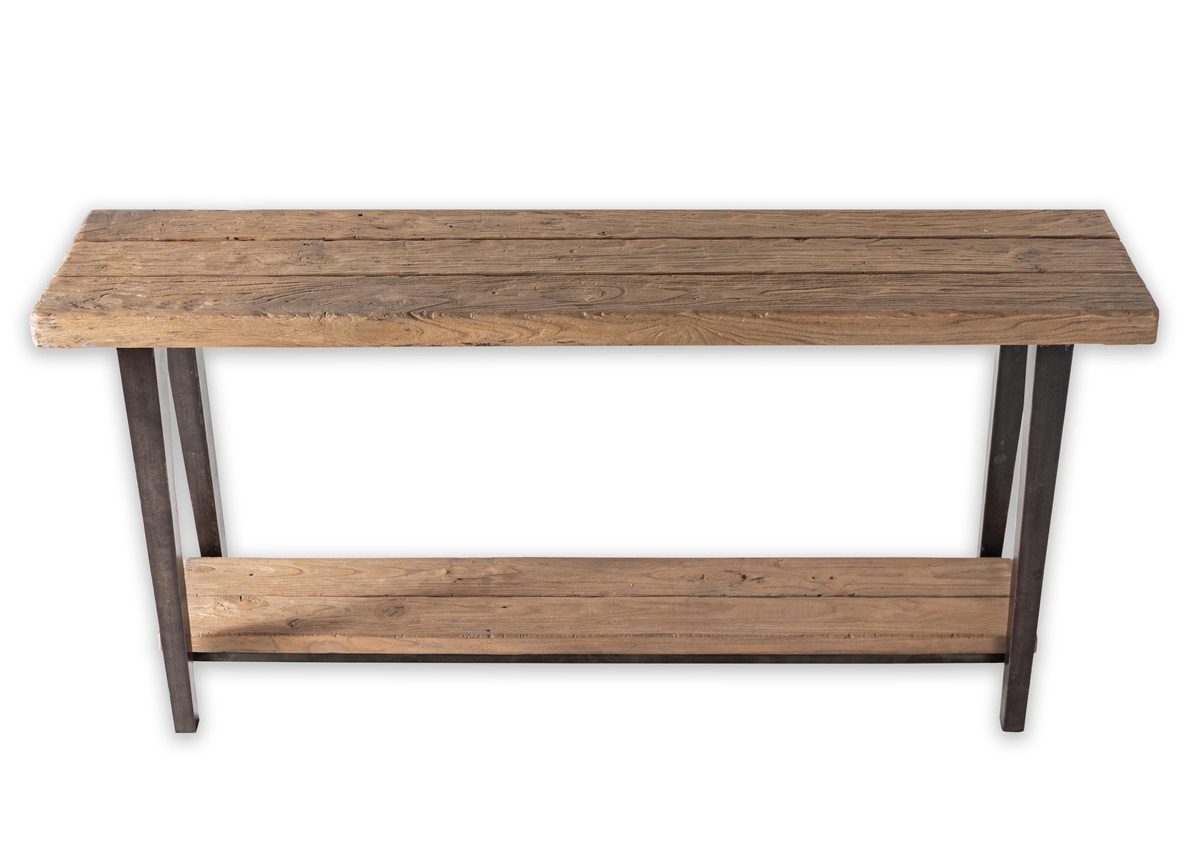 Modern server table in reclaimed distressed elm wood on metal steel base. In my organic, contemporary, vintage and mid-century modern aesthetic.

This piece is a part of Brendan Bass’s one-of-a-kind collection, Le Monde. French for “The World”, the