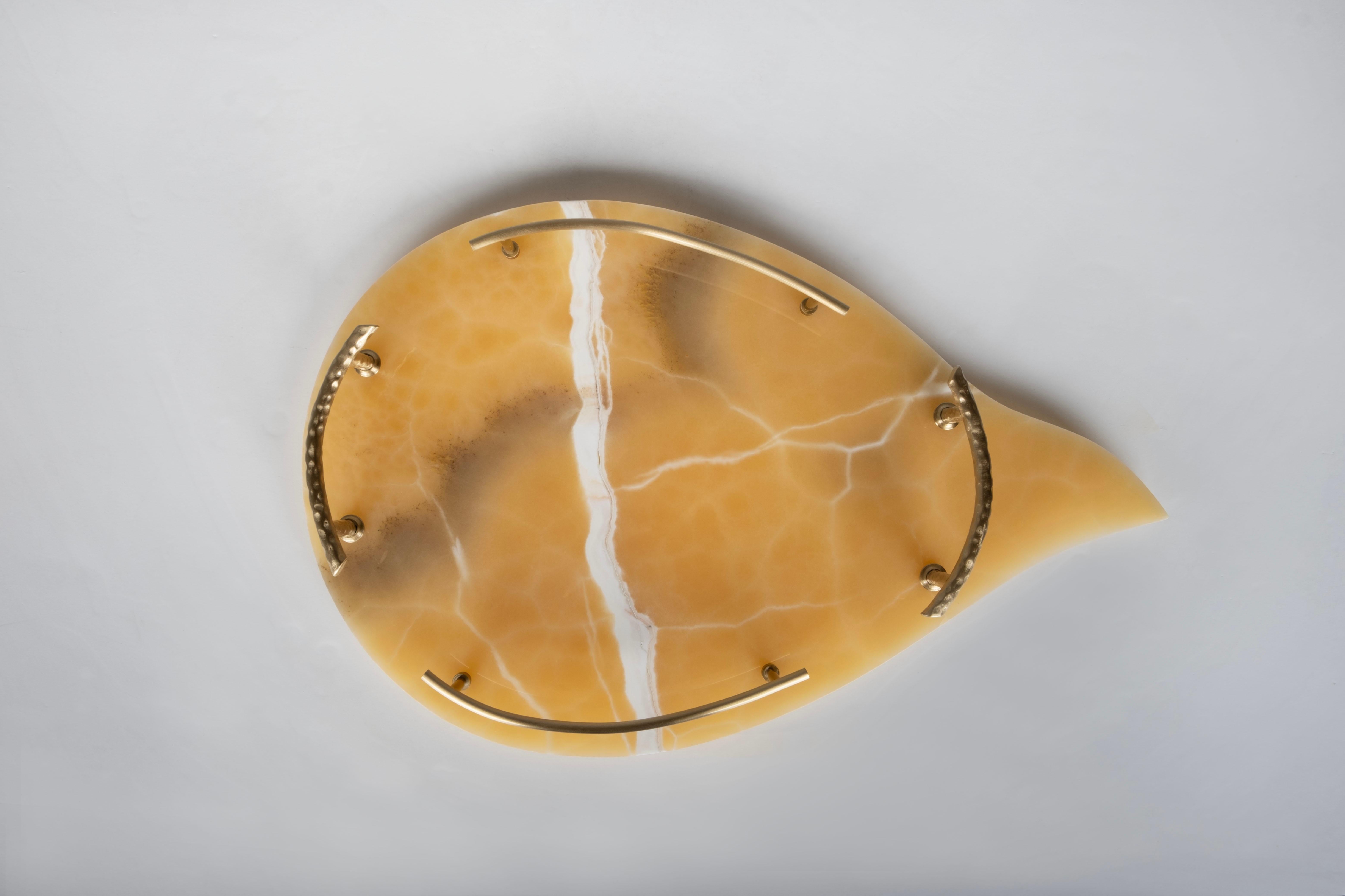 Serving Tray Sakai, Lusitanus Home Collection, Handcrafted in Portugal - Europe by Lusitanus Home.

A sublime serving tray, Sakai was design to uplift layback moments. An organic-shape serving tray in Orange Onyx stone with brass handles in