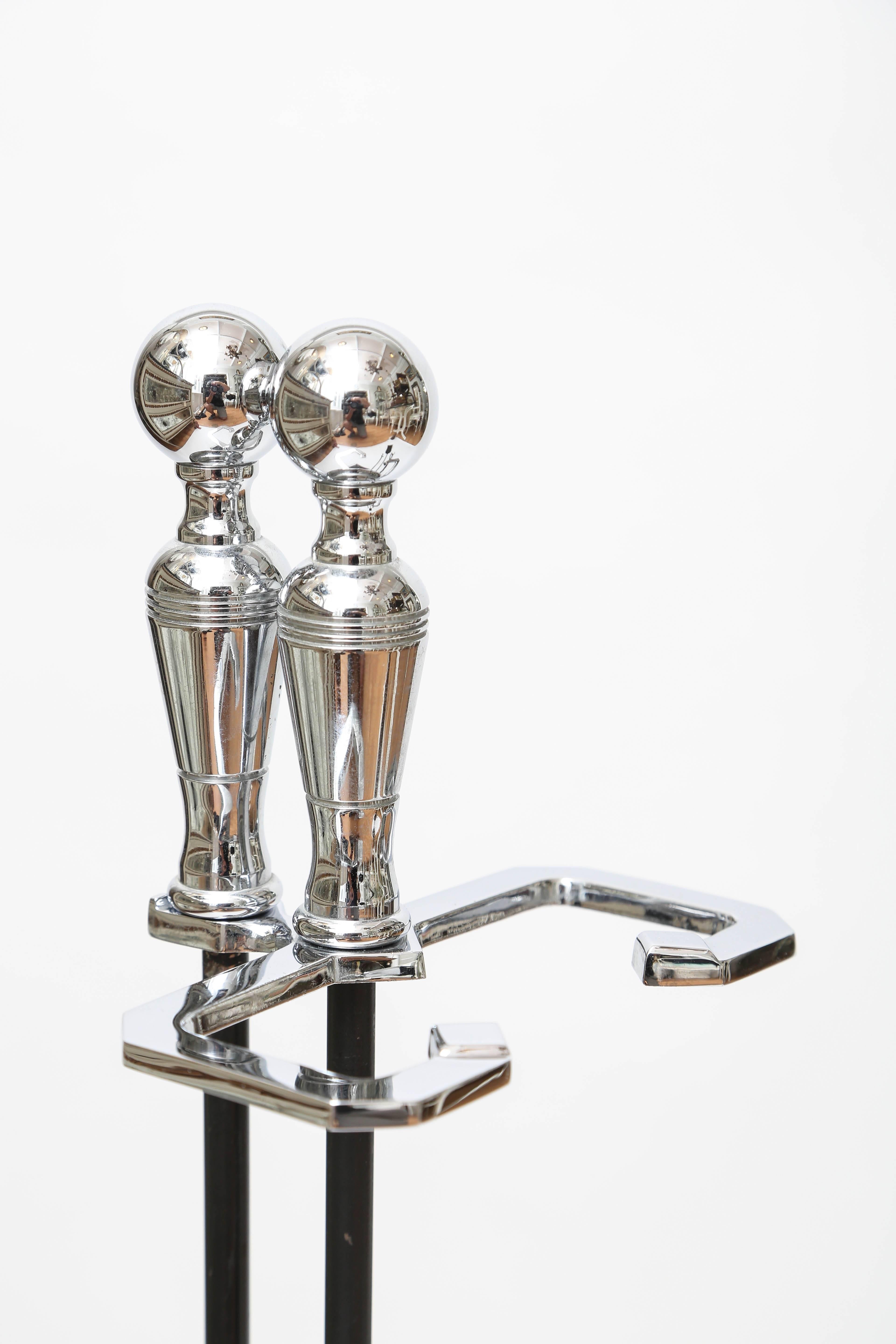 Classical modern black wrought iron and chrome four piece set of fireplace tools and stand.