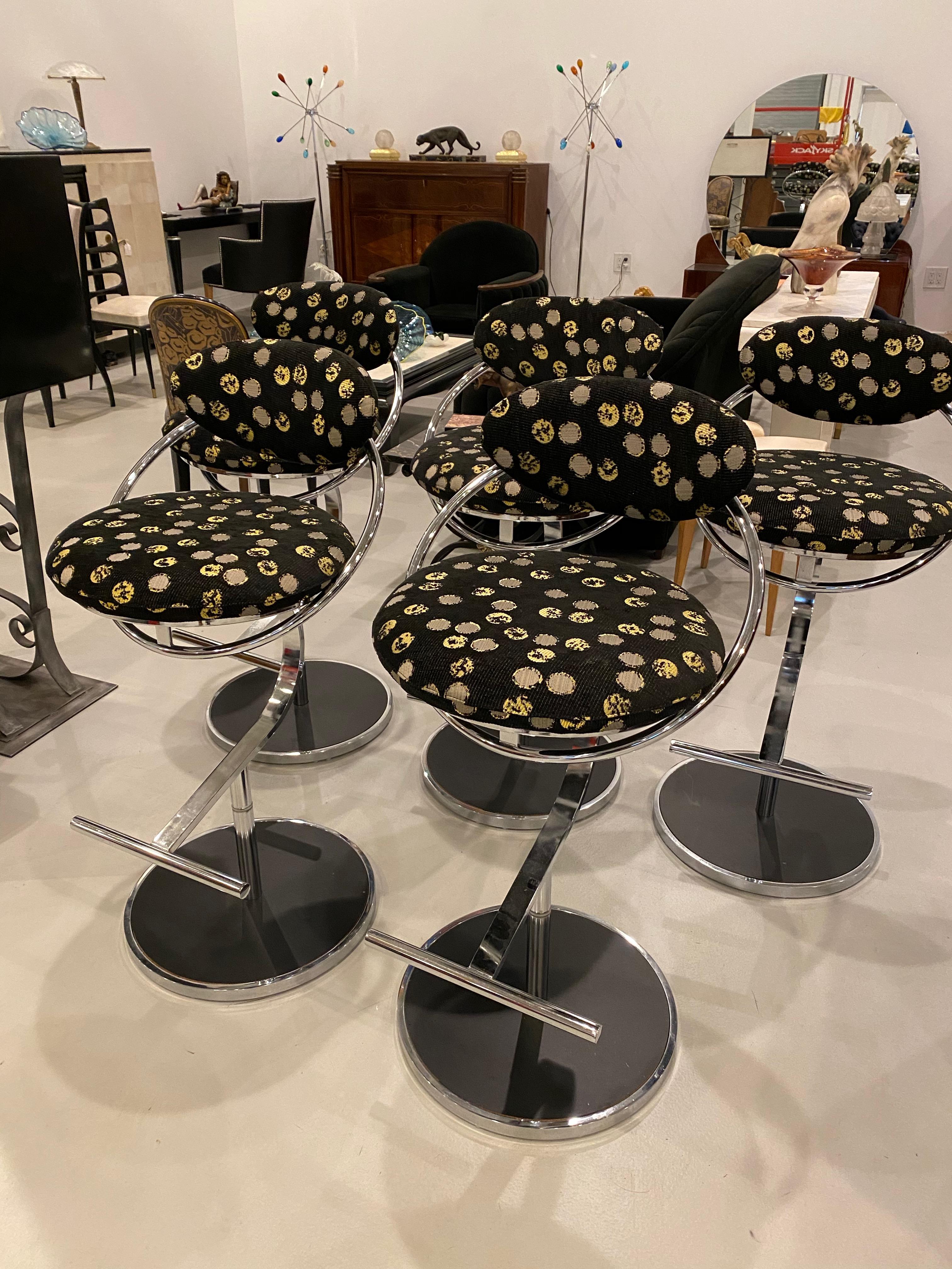 Set of five chrome bar stools. Reupholstery in good condition. Great for a bar or kitchen stools.