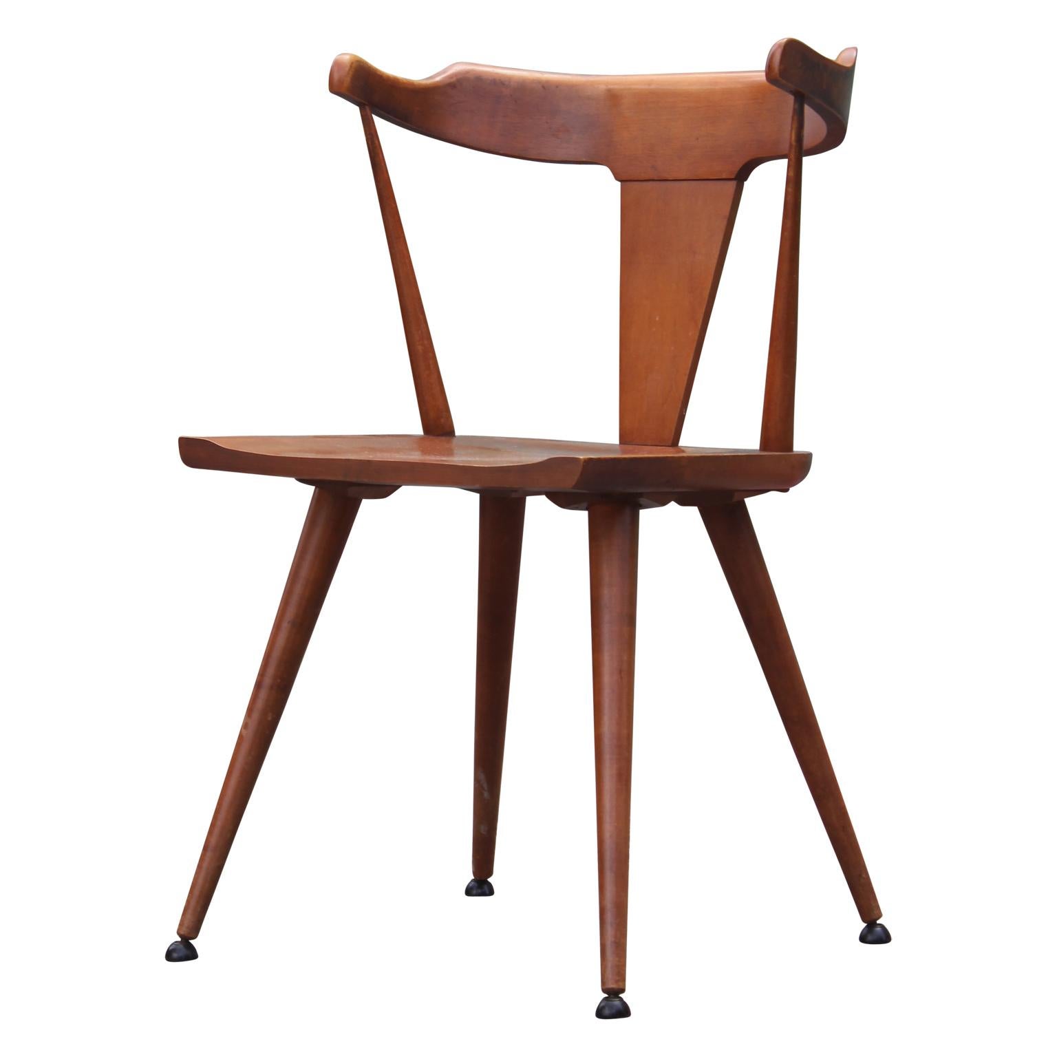 Modern set of four maple spindleback dining chairs by Paul McCobb and manufactured by Winchendon. Model #1530.