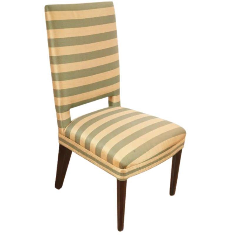 A set of four vintage A. Rudin contemporary armless dining chairs with square backs and upholstered in a green and gold horizontal stripe with tapered legs.