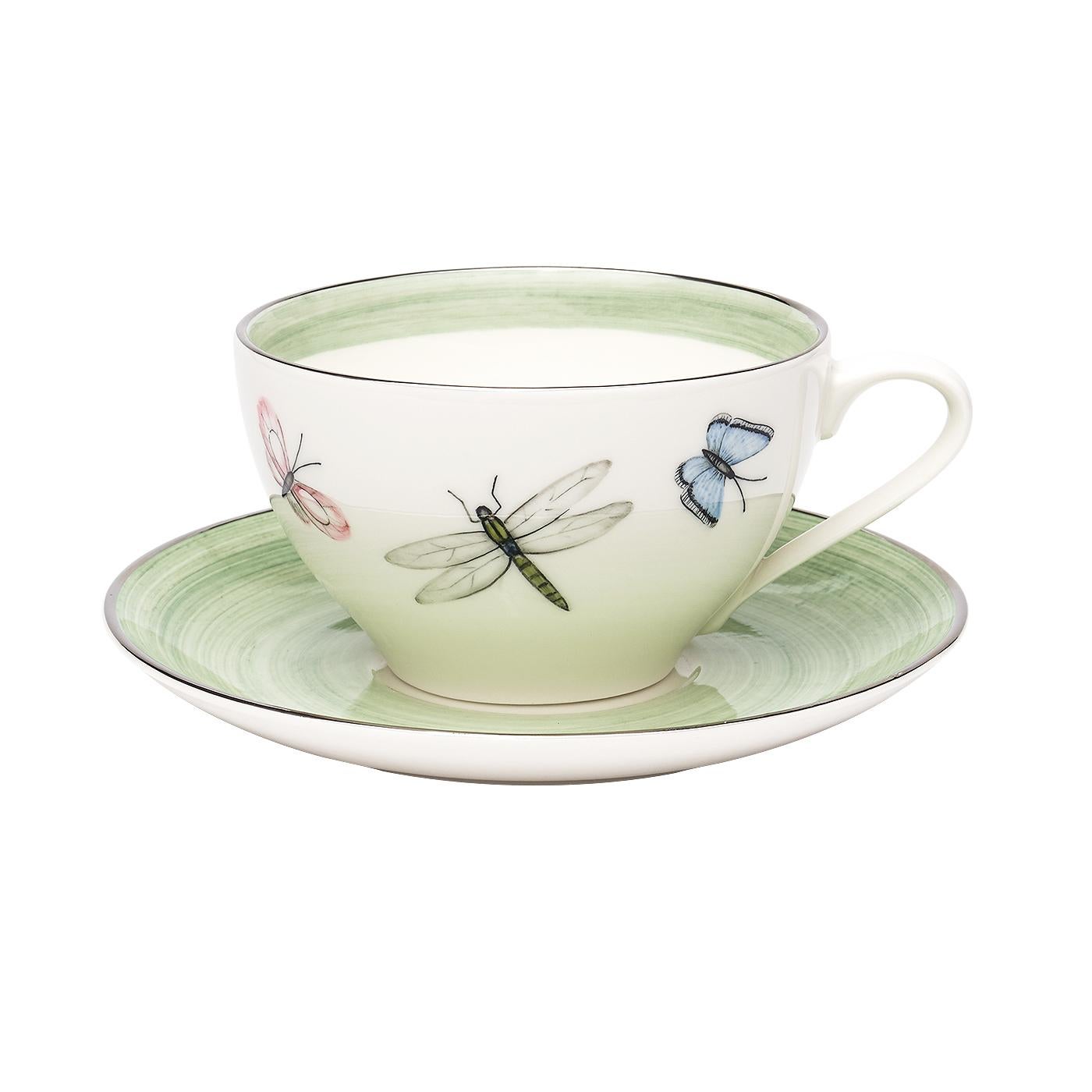 These completely handturned porcelain cups with saucers are hands-free painted in modern decor with butterflies hand painted all around. Comes as a set in three different painted colors. Colors can be mixed within the set.
Rimmed with a platinum