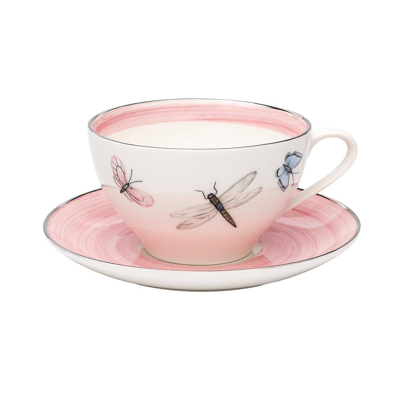 These completely handmade porcelain cups with saucers are painted by hand with a charming hands-free modern decor. The set comes as a set of six hand painted cups with a butterfly decor all-around and rimmed in three different colors. Rimmed by hand