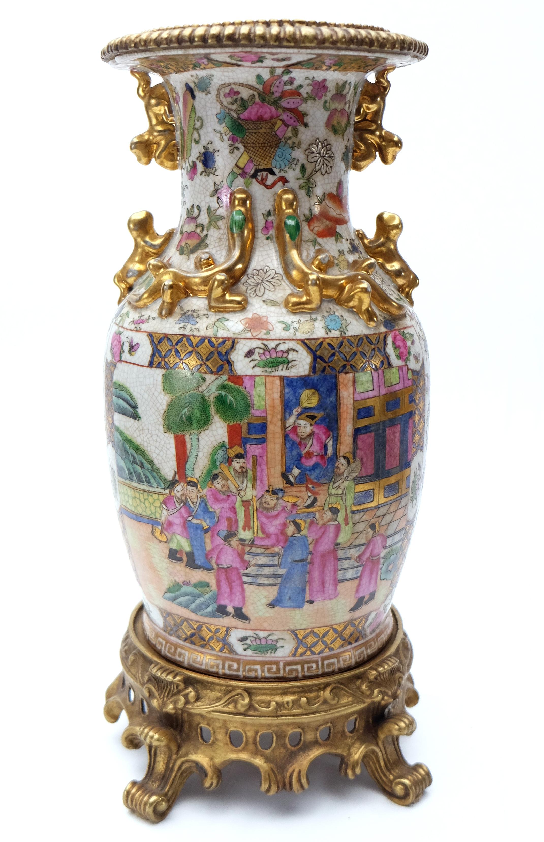 Modern Set of Two Famille Rose Urns on Bronze Stands

Offered for sale are two modern Famille Rose porcelain Chinese vases presented upon ornate bronze stands. Meaning 