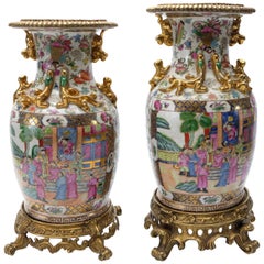 Modern Set of Two Famille Rose Urns on Bronze Stands