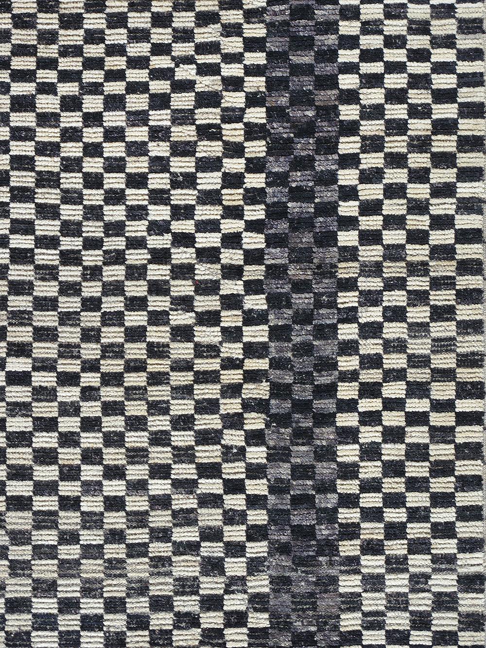 Our checkered runner is handknotted from the finest hand-carded, hand spun, naturally dyed wool. This modern style can be customized and made in specific colors and sizes.