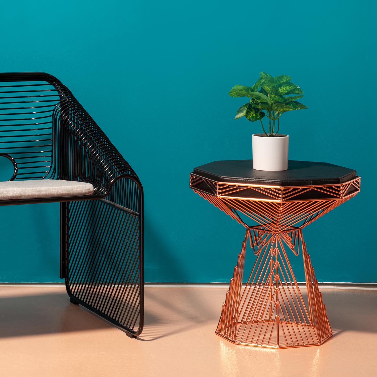 Bend Goods wire furniture
The ultimate in versatile modern wire furniture, the switch table and stool is a two in one piece that works as a stool or table. The tabletop features a padded leather seat on one side, and a flat table surface on the