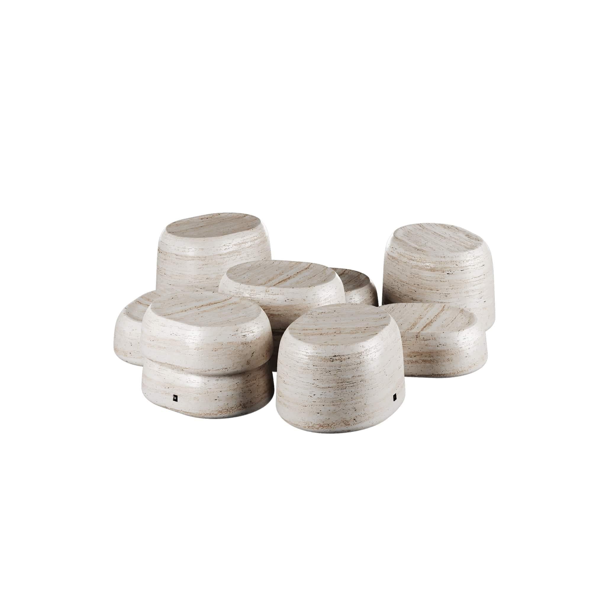 Fifih Side Tables Travertine Set 10 is a modern style set of three side tables in travertine marble. Entirely crafted of stone, this set flaunts a clean and sleek design, merging harmonious geometry and pure materials. Featuring different heights,
