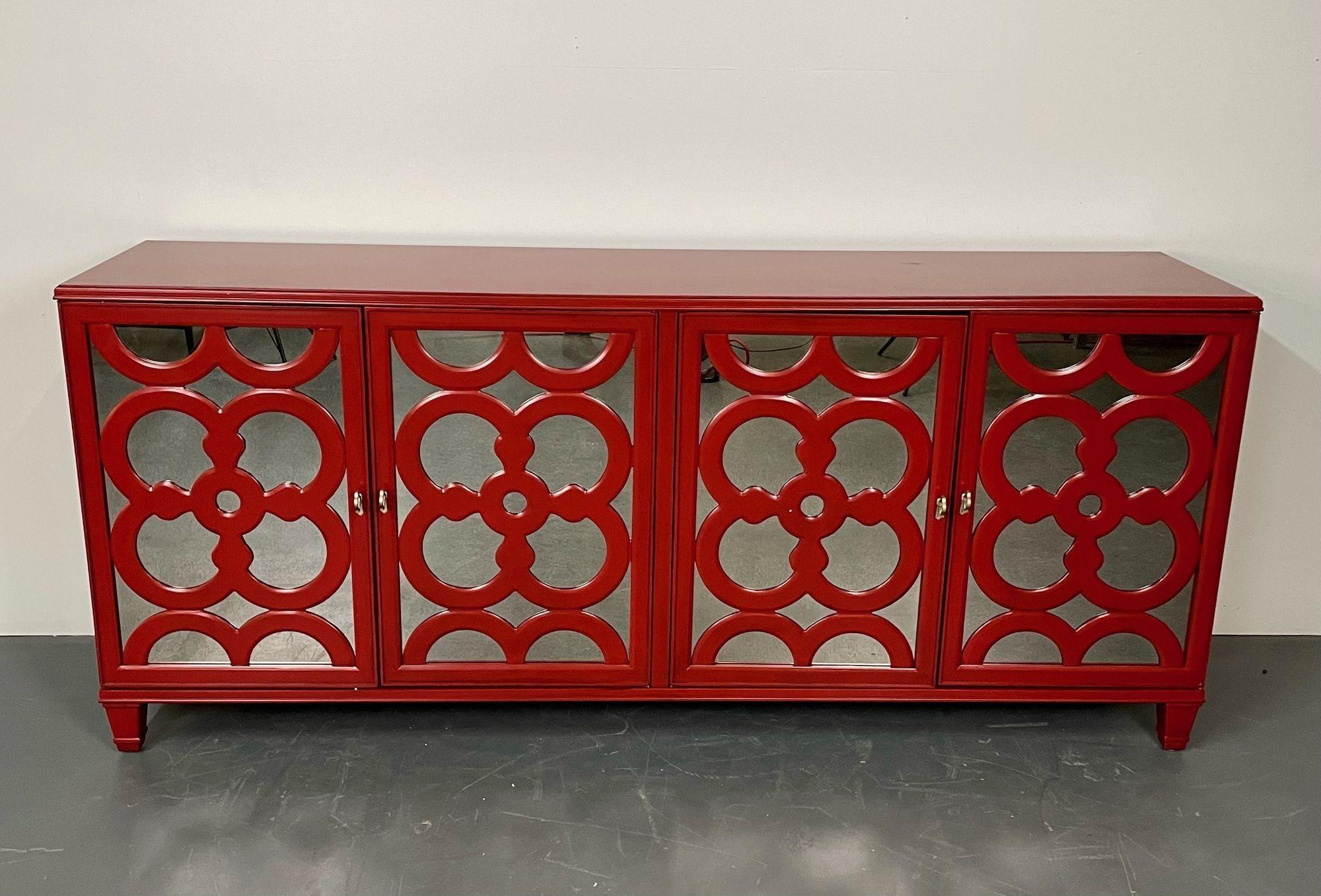 Modern sideboard, dresser or chest, red lacquered, mirrored.
A newly manufactured sideboard in a red lacquered and mirror finish. The case with four doors having mirrored fronts and circular wood design leading to fitted drawers interiors with
