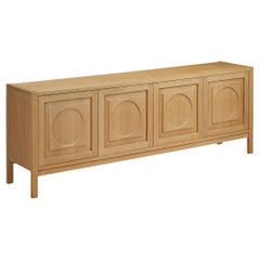 Buffet moderne avec sculptures circulaires en chêne blond