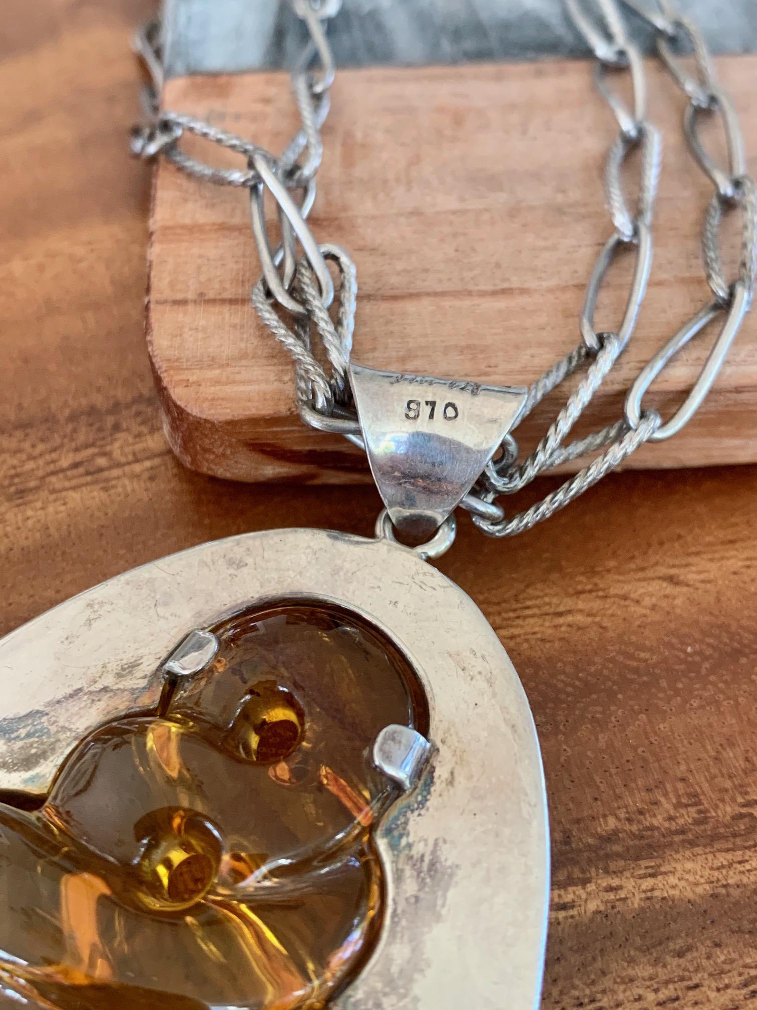 Mixed Cut Modern Signed .970 Silver and Carved Amber Pendant and Chain For Sale