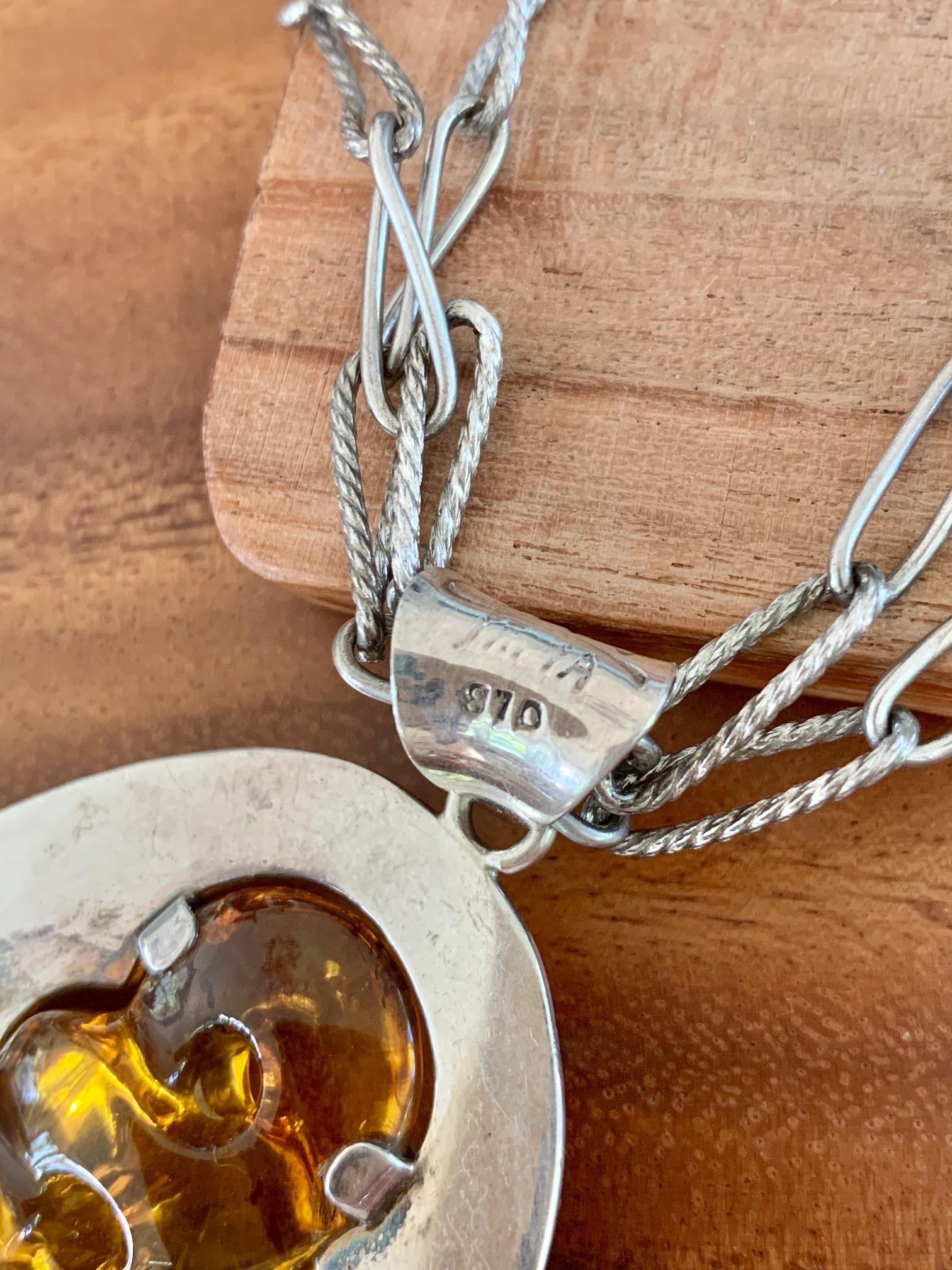 Modern Signed .970 Silver and Carved Amber Pendant and Chain In Good Condition For Sale In St. Louis Park, MN