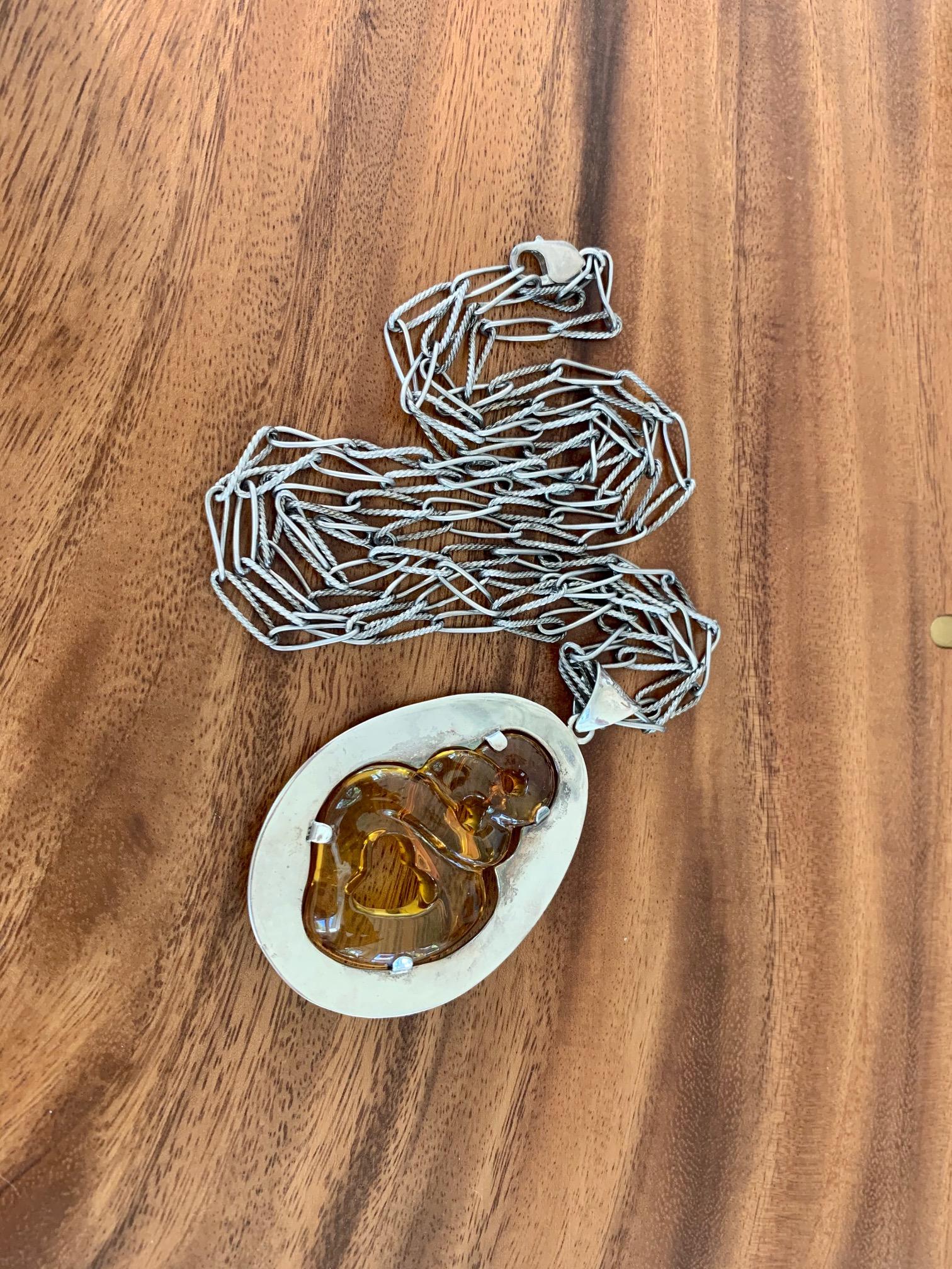 Women's Modern Signed .970 Silver and Carved Amber Pendant and Chain For Sale