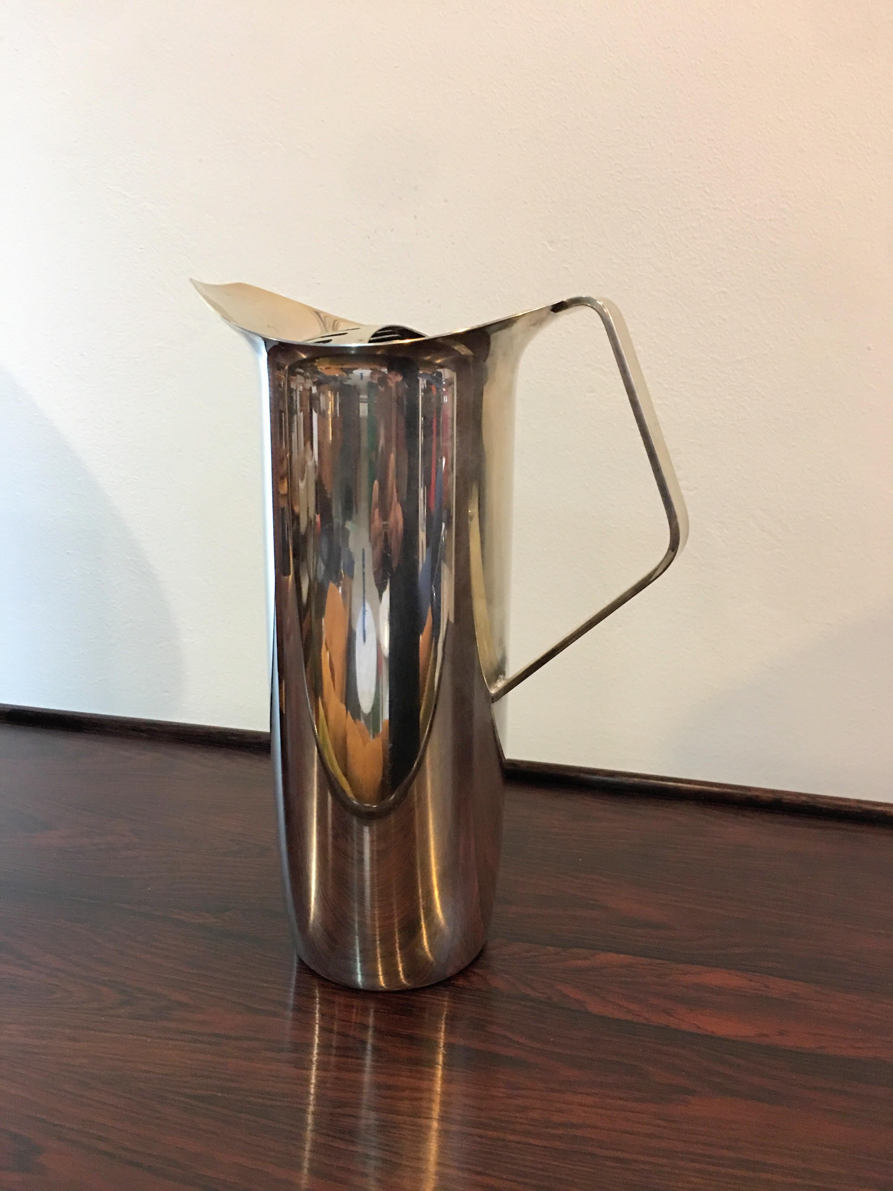 Very nice modern silver plated water pitcher Perfect to go with your mid century barware. Perfect wedding gift for that special couple.