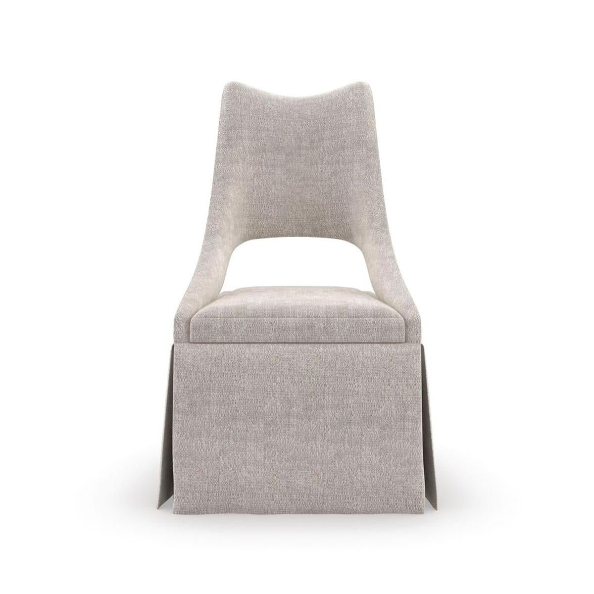 Dressed in a softly textured chenille performance fabric with a silver metallic ground, this elegant tall back chair works beautifully in home office spaces, or bedrooms and dressing areas. For a classic touch: a crisply tailored waterfall skirt