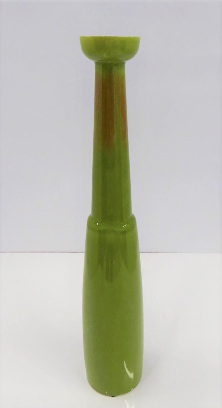 REDUICED FROM $225....Modern tall slender ceramic vase by Jaru of California from the 1960s. Great body shape with beautiful green tone overall with a splash of orange around the slender neck and lava like overflowing darker green glaze on the