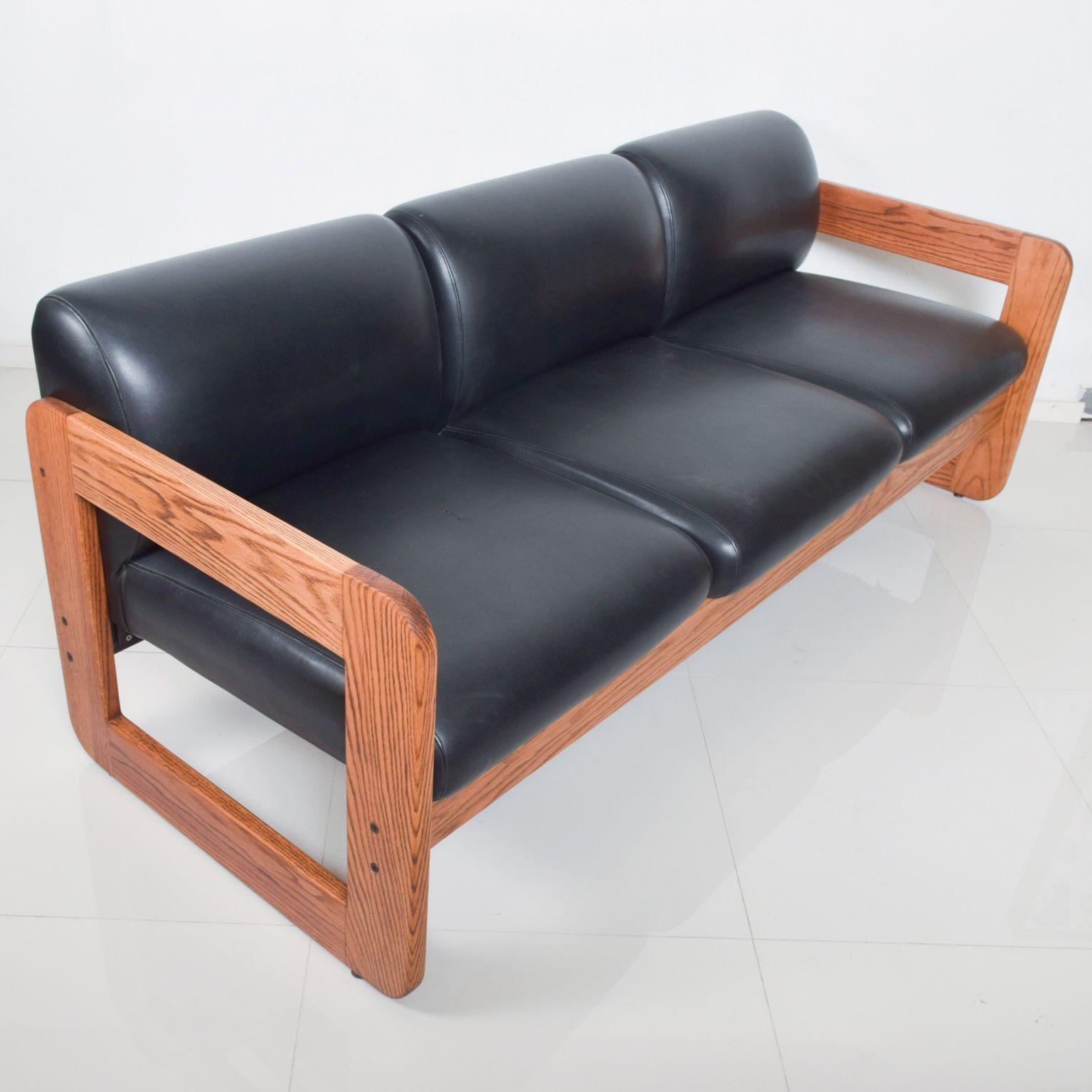 Presenting: LOU HODGES Modern Sling Sofa California Design Group 1970s
Attributed to Lou Hodges. Unmarked.
Sofa rests on a beautiful solid oak wood frame. Extremely comfortable with fabulous clean modern lines. 
New upholstery is recommended.