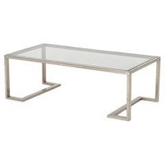Moderner Couchtisch mit Rauchglasplatte und Metall