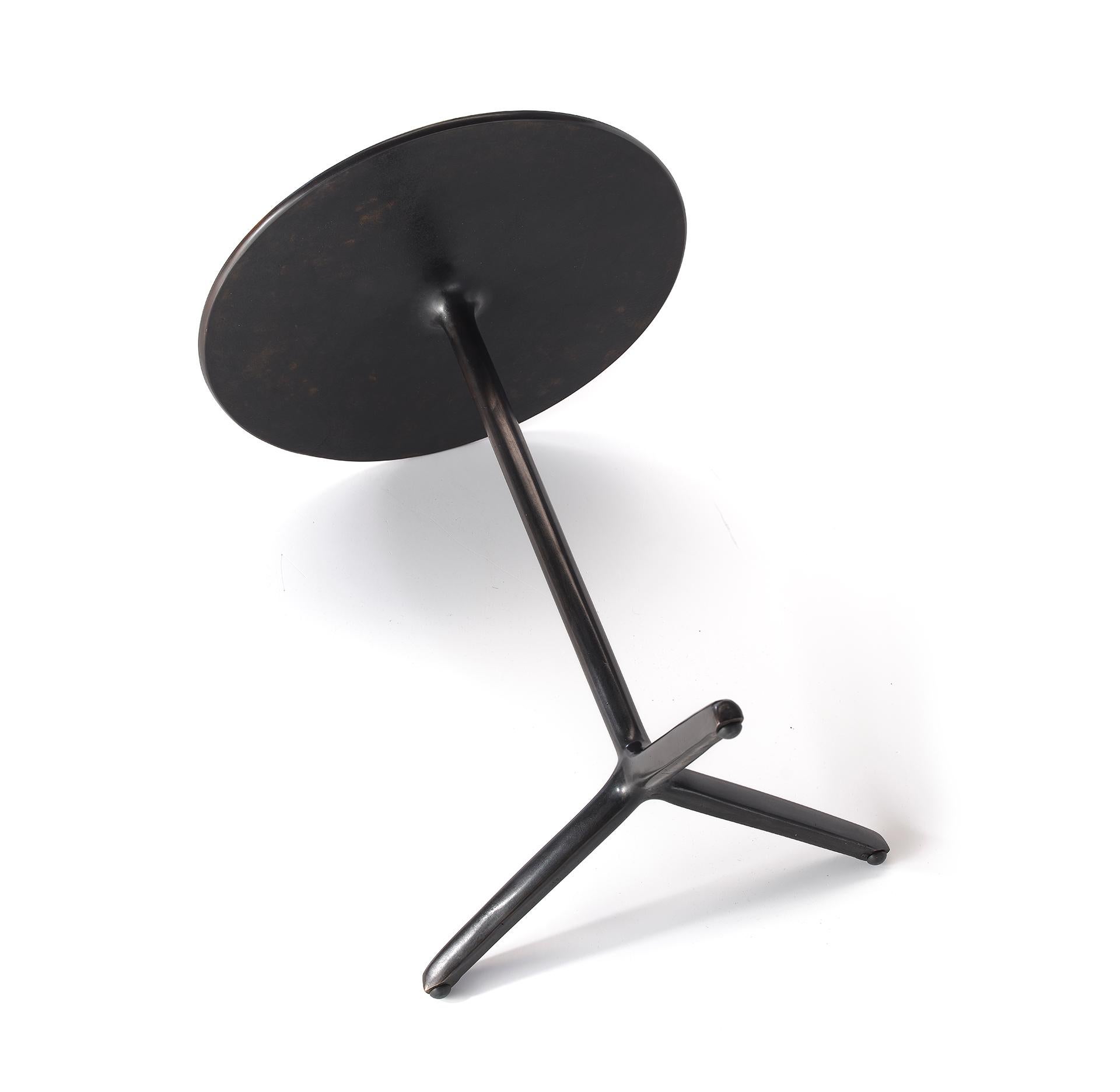 Cast Modern solid cast bronze side table with polished top and flame-treated base For Sale