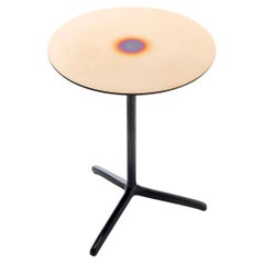 Modern solid cast bronze side table with polished top and flame-treated base