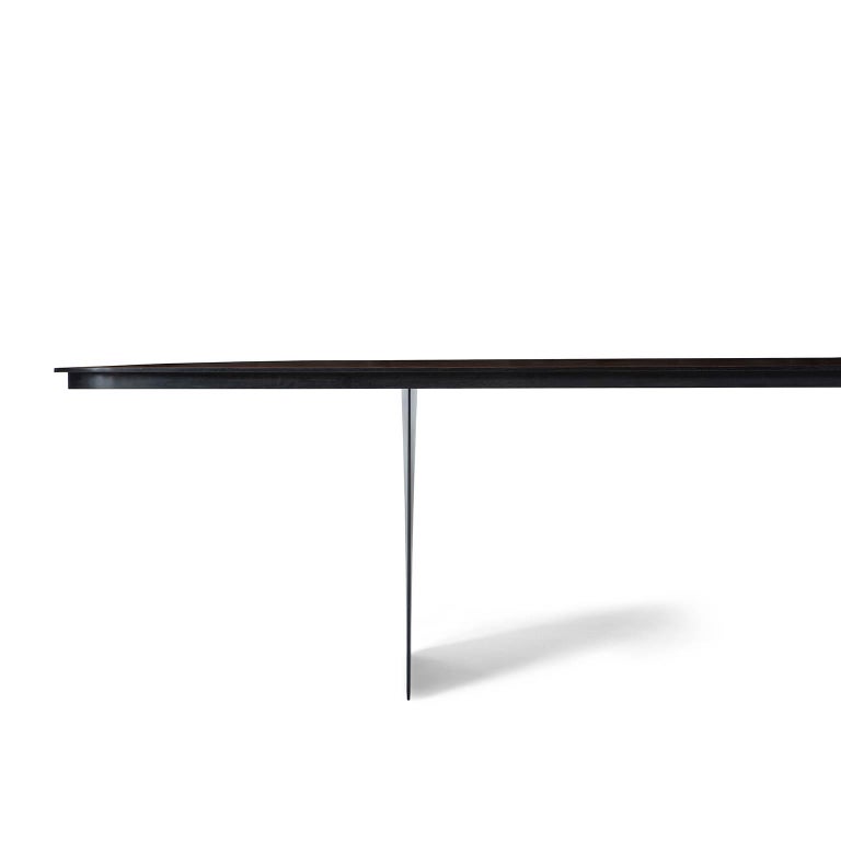 Modern Carbon Claro Table with Walnut Top and thin Carbon Fiber Legs by Tokio. For Sale at