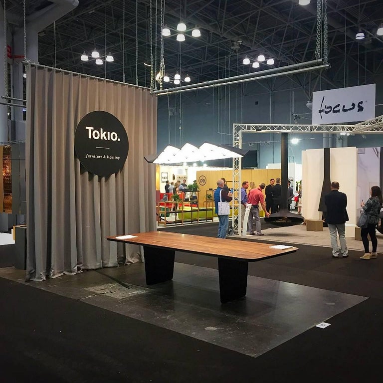 Modern Carbon Claro Table with Walnut Top and thin Carbon Fiber Legs by Tokio. For Sale at