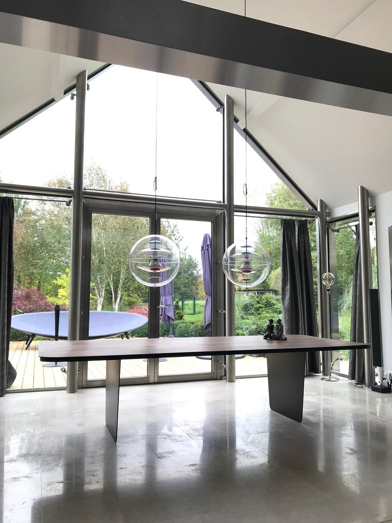 Modern Carbon Claro Table with Walnut Top and thin Carbon Fiber Legs by Tokio. For Sale at