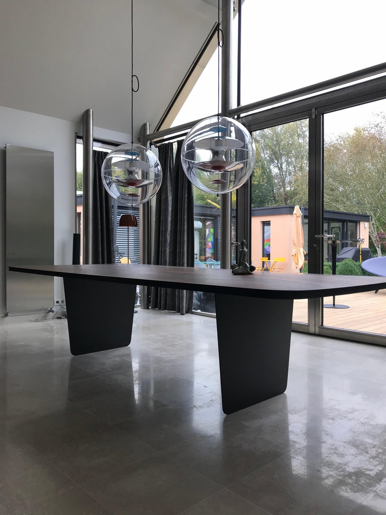 Modern Carbon Claro Table with Walnut Top and thin Carbon Fiber Legs by Tokio. For Sale at