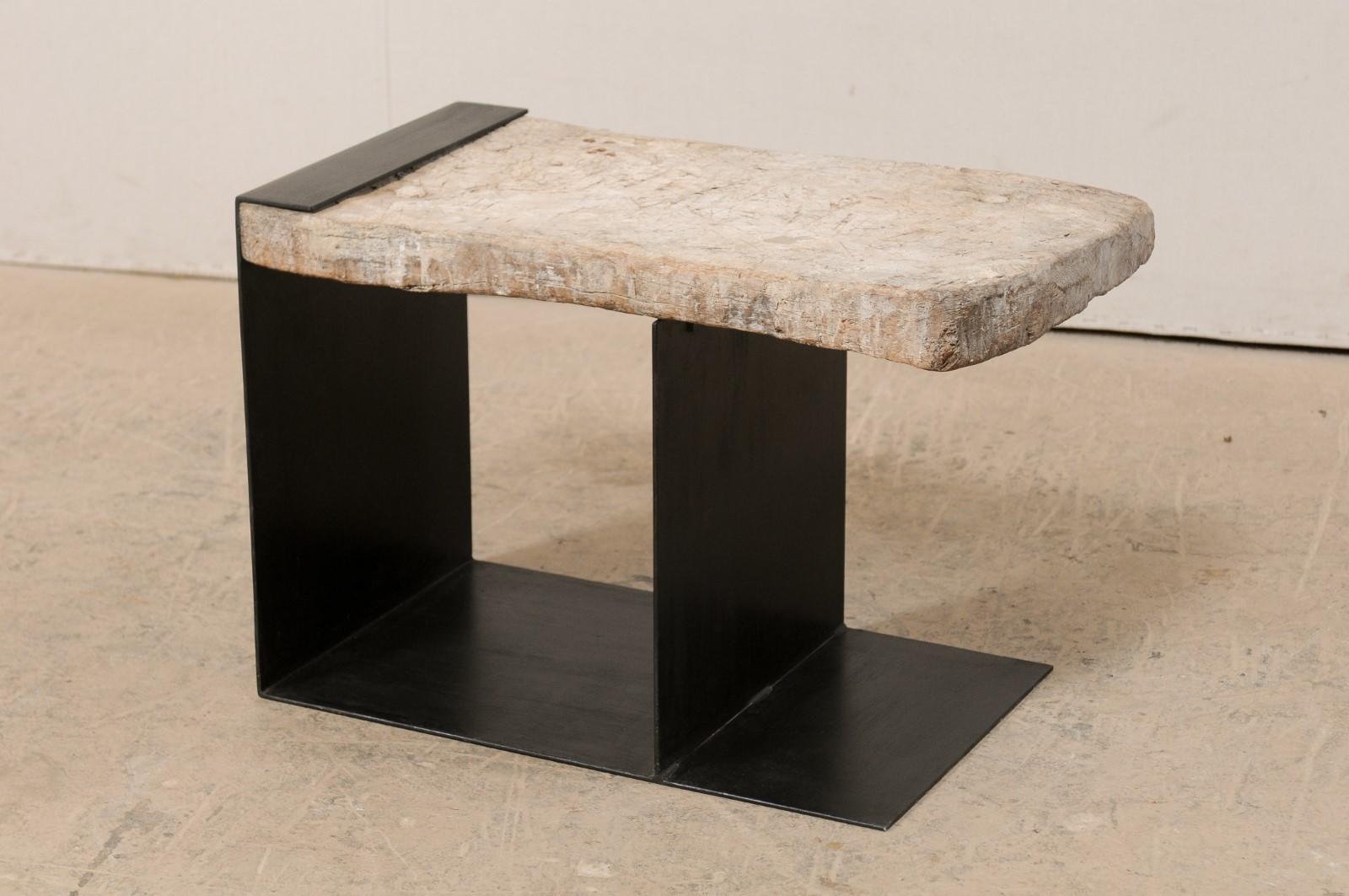 A modern-designed custom coffee table with 19th century Spanish butcher block top. This unique and one-of-a-kind piece has been created with an intriguing mix of rustic and modern elements. The top of this table is comprised of a 19th century wooden