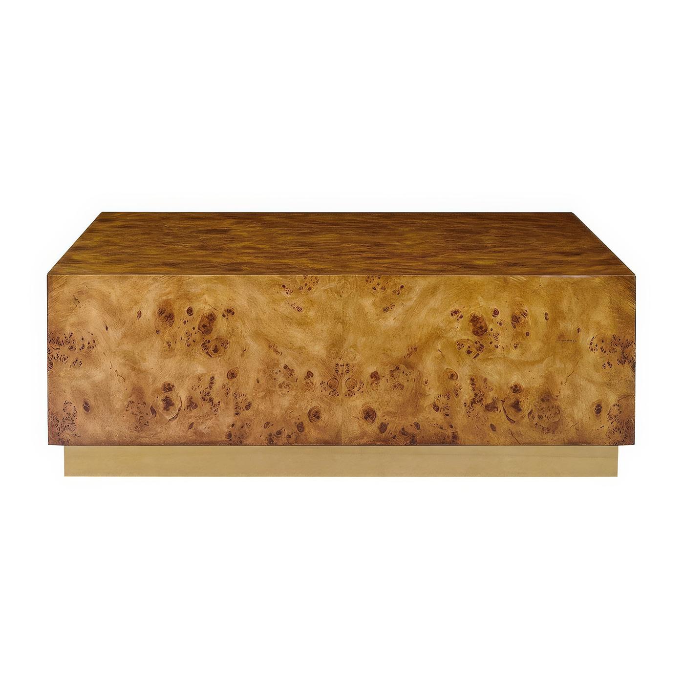 Featuring richly textured Mappa burl veneer with a medium polished finish that highlights its naturally occurring swirls and patterns. The striking cube-shaped design celebrates clean geometric lines, while the sleek brass plinth base provides an