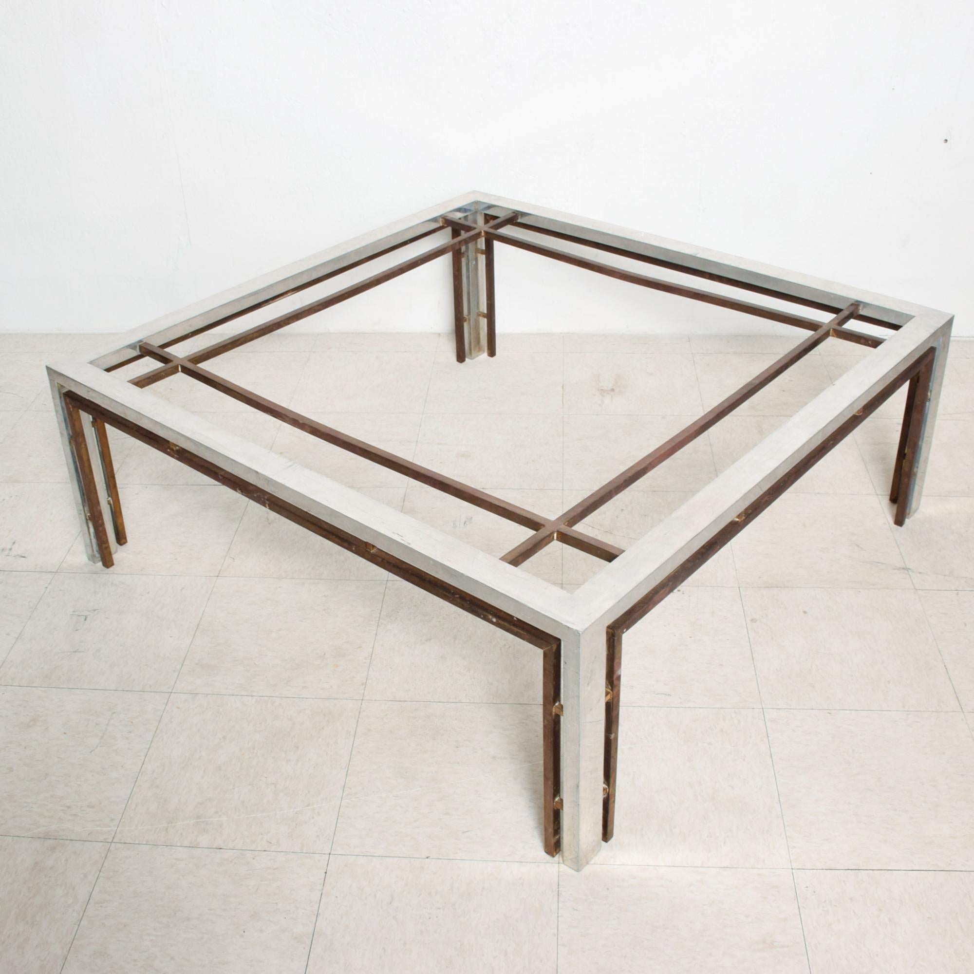 For your consideration: Square coffee table Arturo Pani made in Mexico circa 1960s Modular design
Constructed in aluminum and bronze. Glass top. 
Attributed to Arturo Pani. Unmarked.
Dimensions: 43.5 x 43.5 x 15 .88 inches
Original vintage