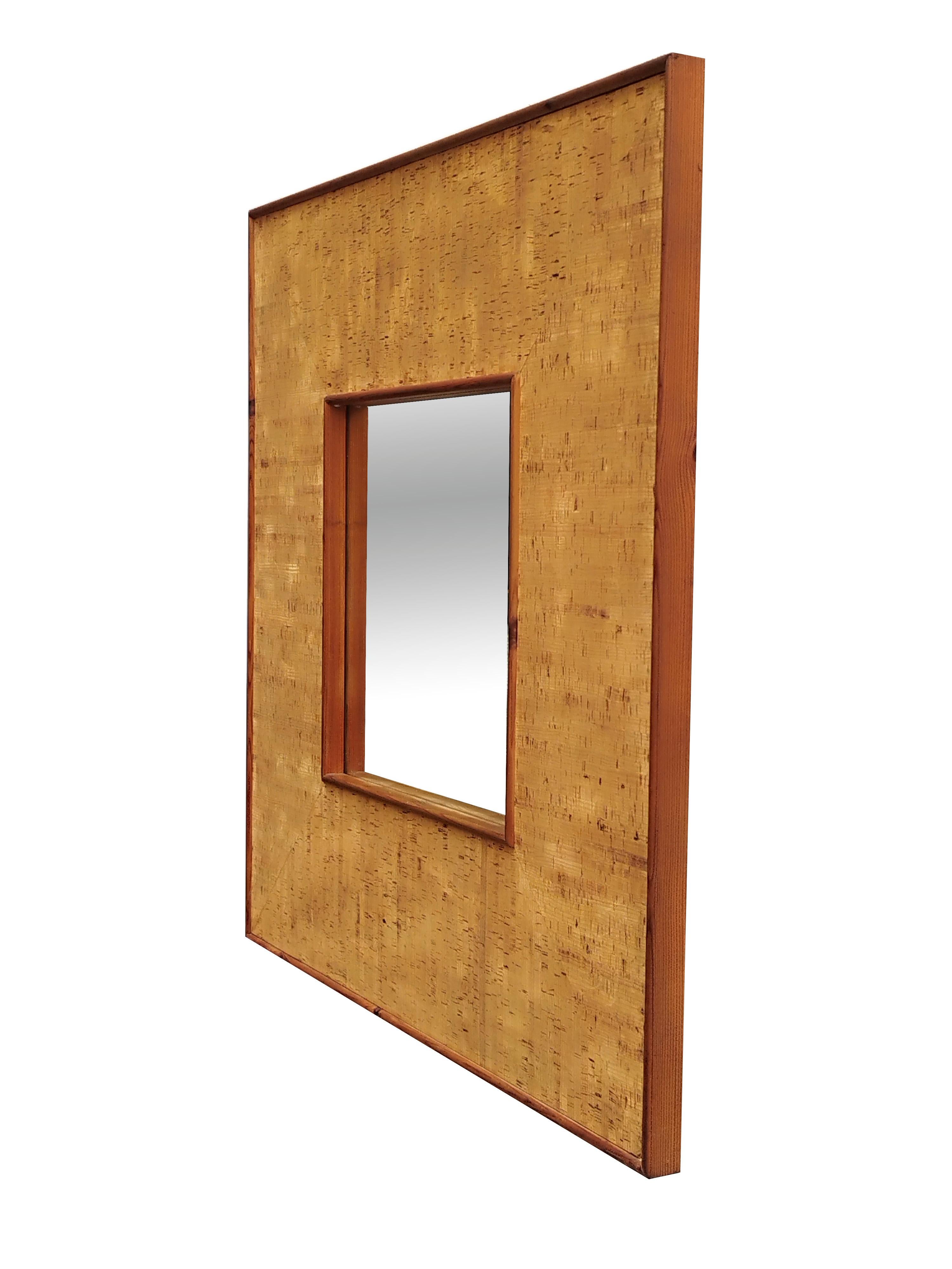 Italian modern square cork mirror.
This beautiful mid-century Italian square cork mirror was made from a very unusual type of cork and is versatile enough to be used in a variety of interior or design themes.
