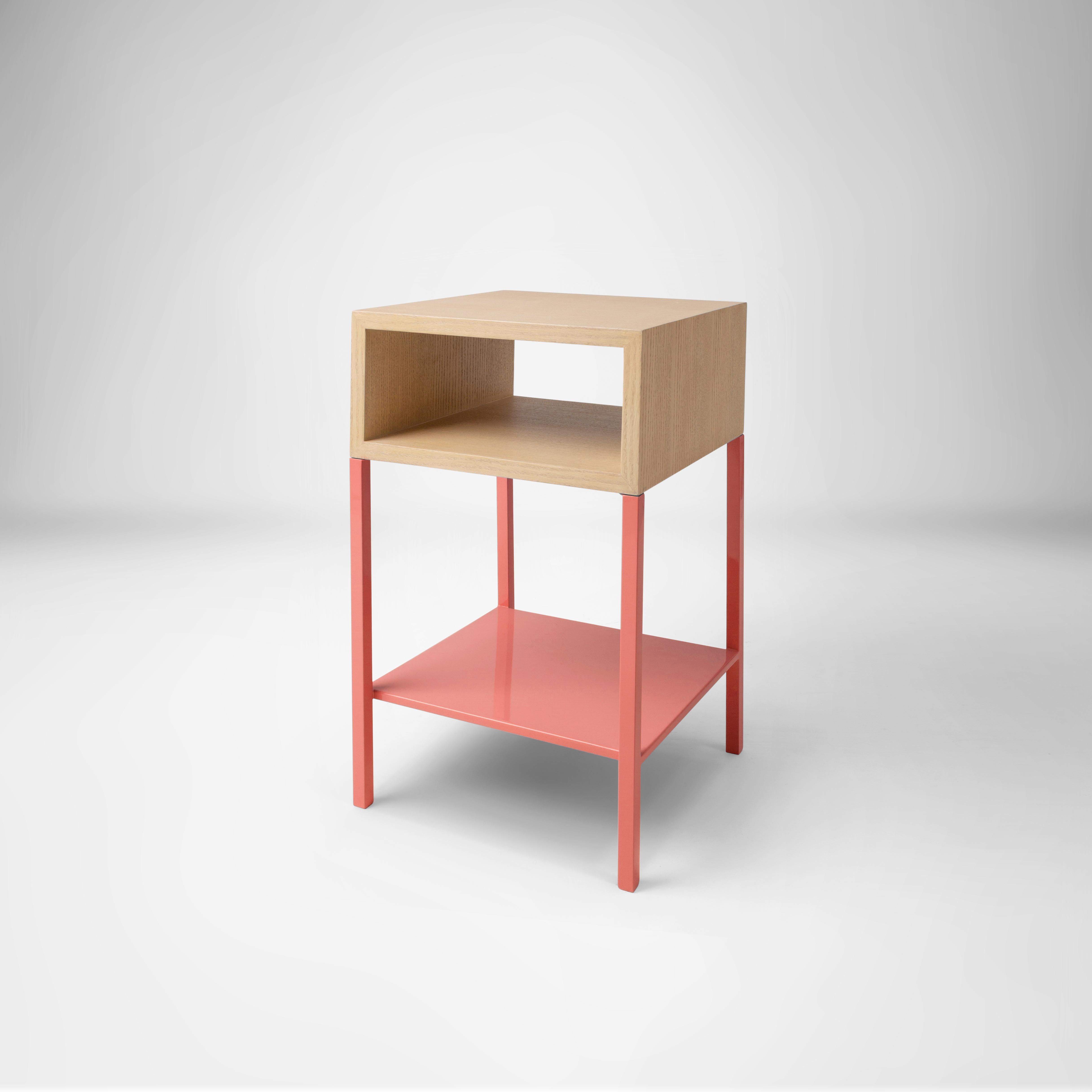 Modern Square Oak Wood Nightstand with Coral Metal Legs and Shelf
Colorful and a whole lot of fun, our Cubism inspired nightstands will add just the right touch of style and color to your bedroom. They come in three different soothing colors, ideal