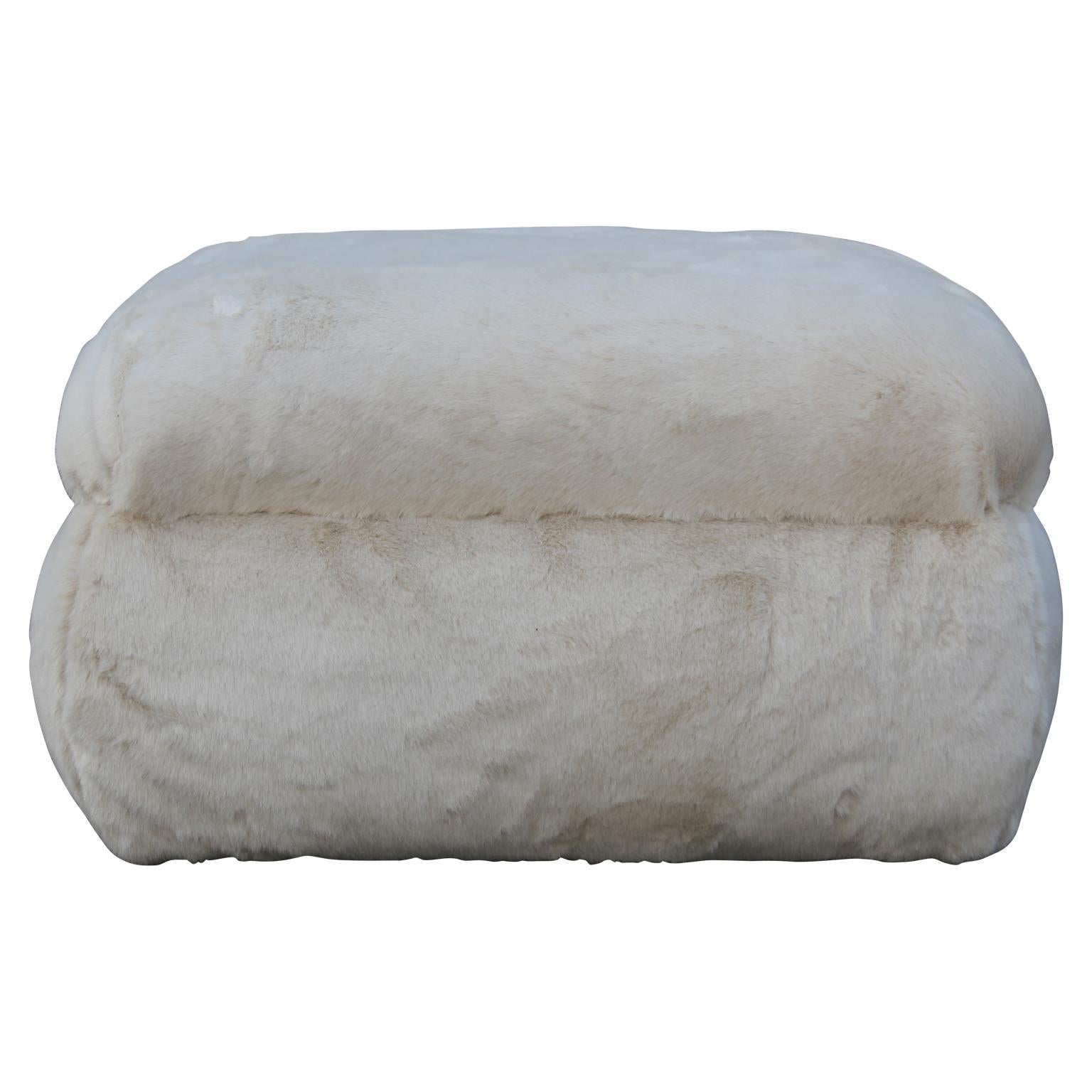 Gorgeous and lush ottoman or pouf freshly upholstered in a lush cream or neutral colored faux fur. Very soft to the touch.