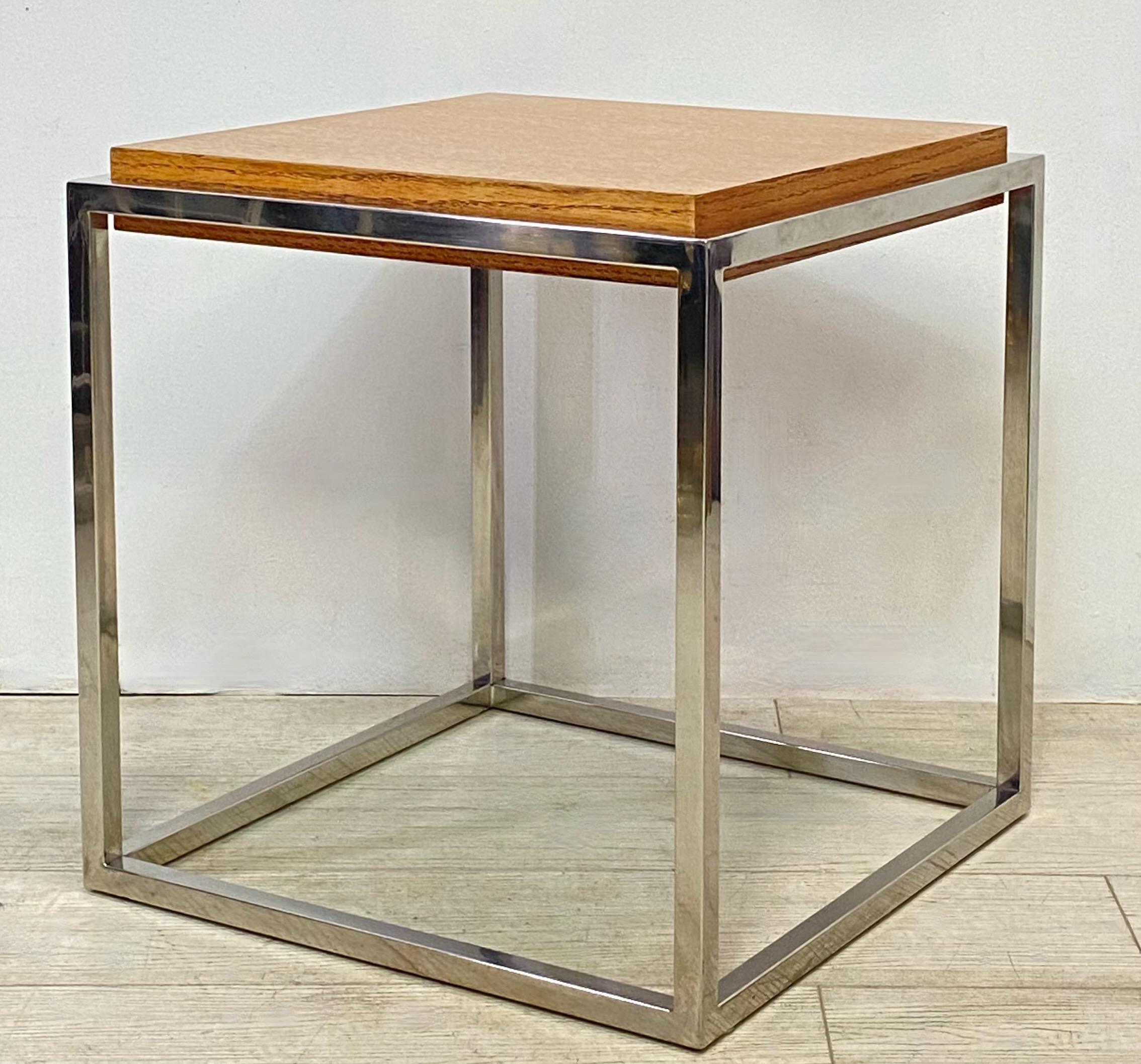 Modern stainless steel cube table with inset oak veneered top.
Recently refinished, and in excellent condition.
American, 20th century.

