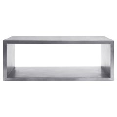 Moderna mesa de cóctel de acero inoxidable diseñada por Greg Sheres.  Ahora en stock.