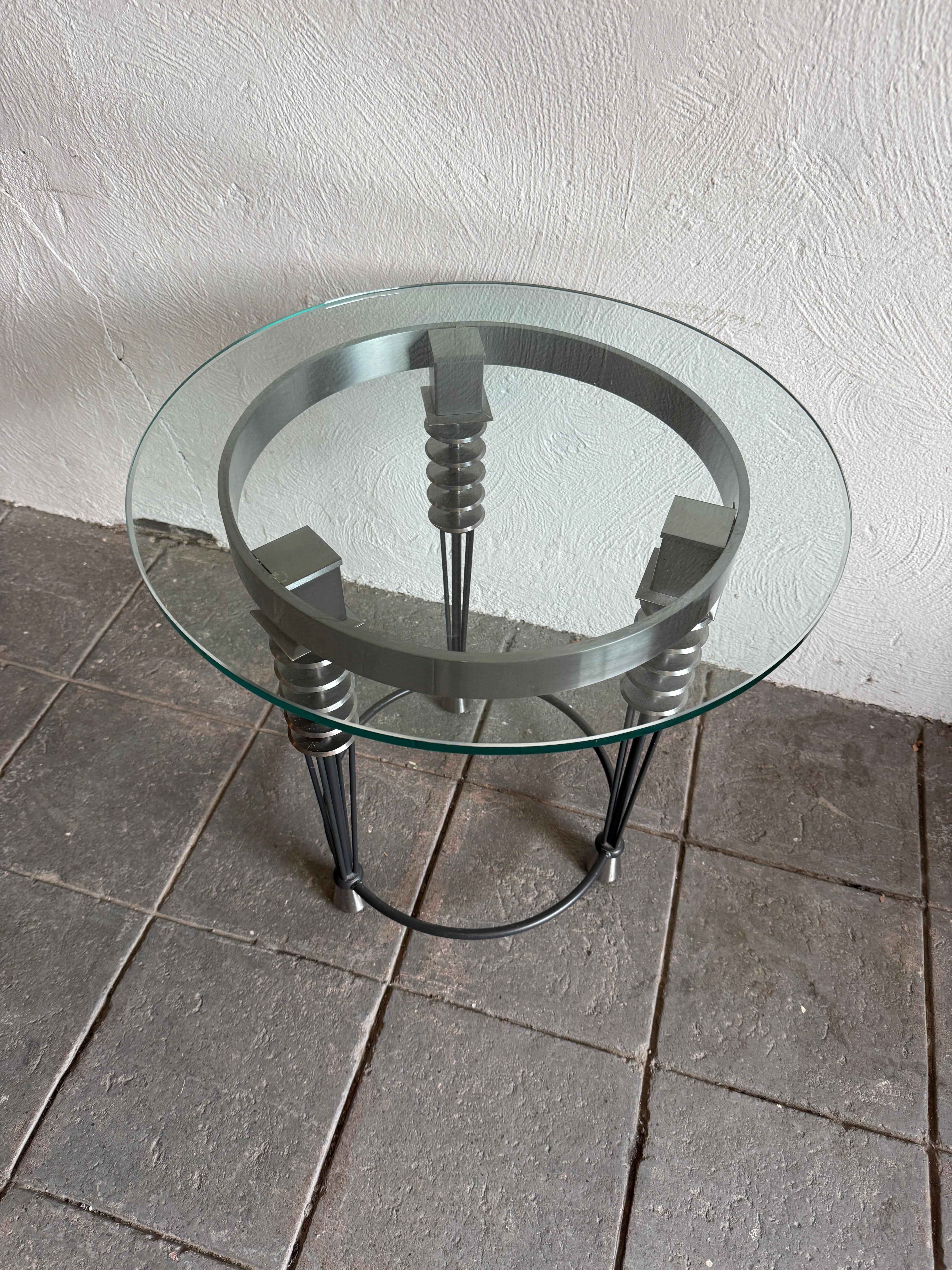Modern Stainless steel glass side table by Larry Laslo for Directional. Labeled - Great small side table in good pre owned condition. Pick up in Brooklyn or Kingston NY. 

Message me for a shipping quote.

Measures 24