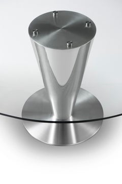 Modern stainless steel round dining table designed by Greg Sheres:  In Stock.